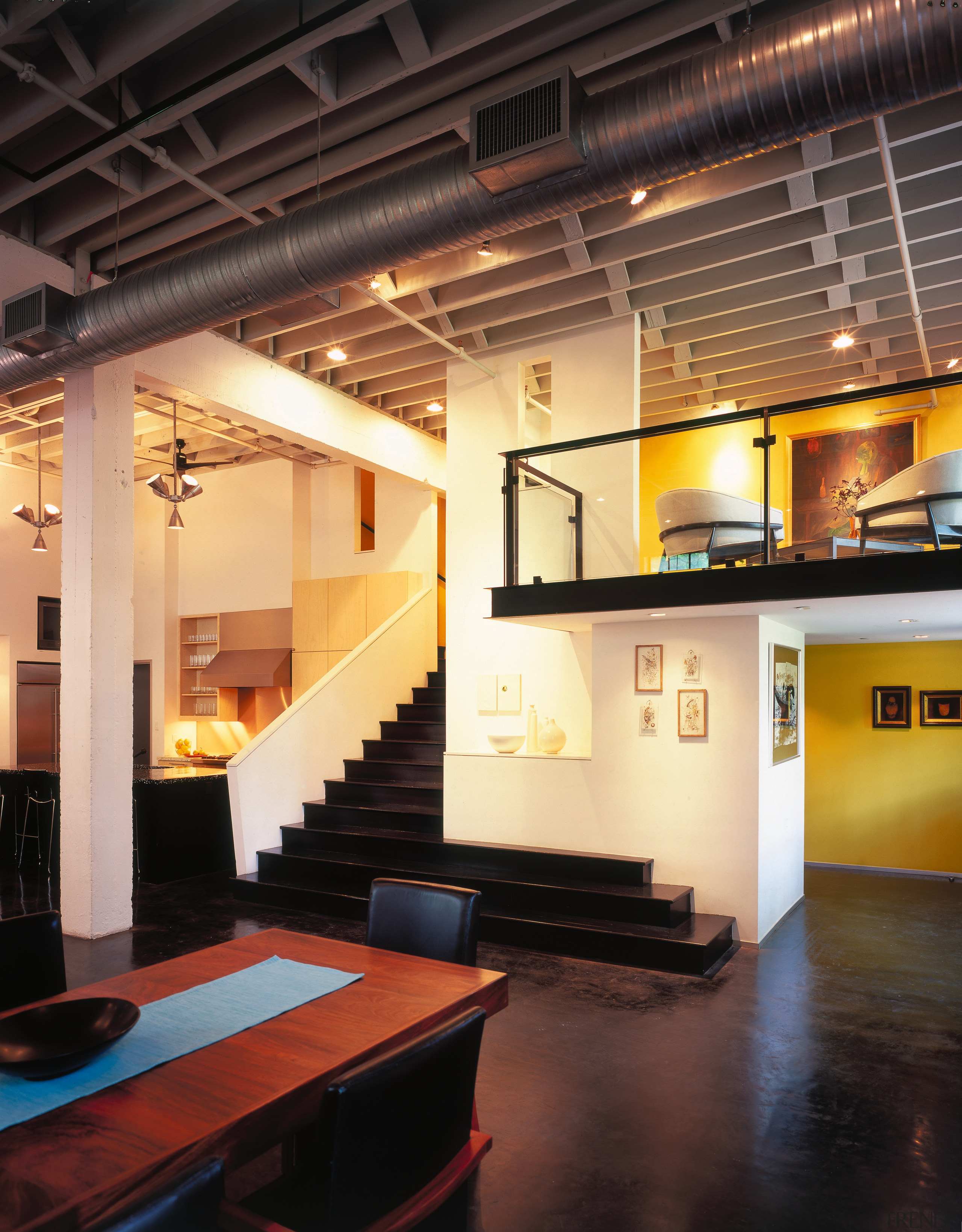 A view of the living area an staircase, architecture, ceiling, interior design, lobby, loft, black, orange