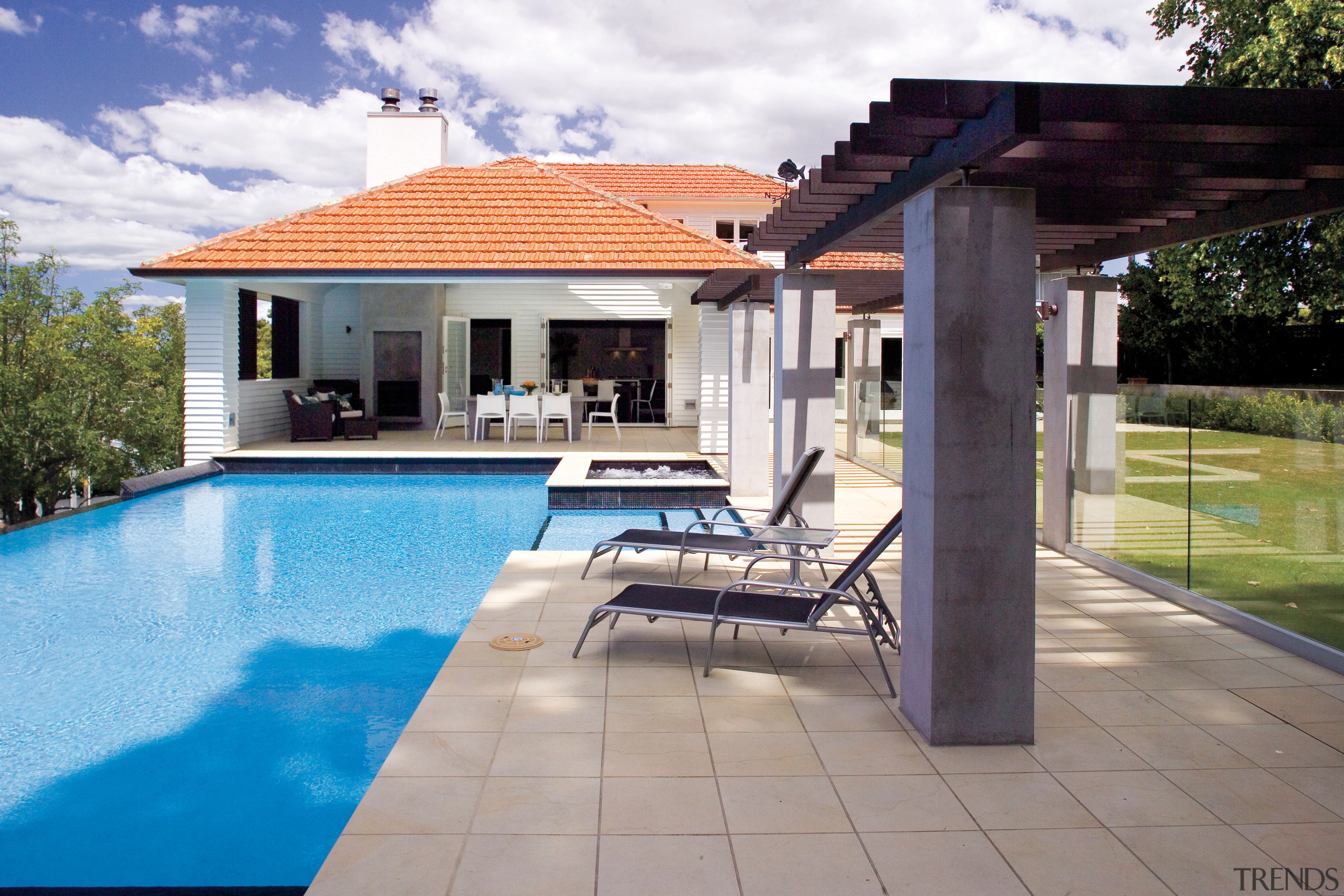 A view of the outdoor undercover entertaining area backyard, estate, facade, home, house, leisure, outdoor structure, property, real estate, residential area, swimming pool, villa, gray