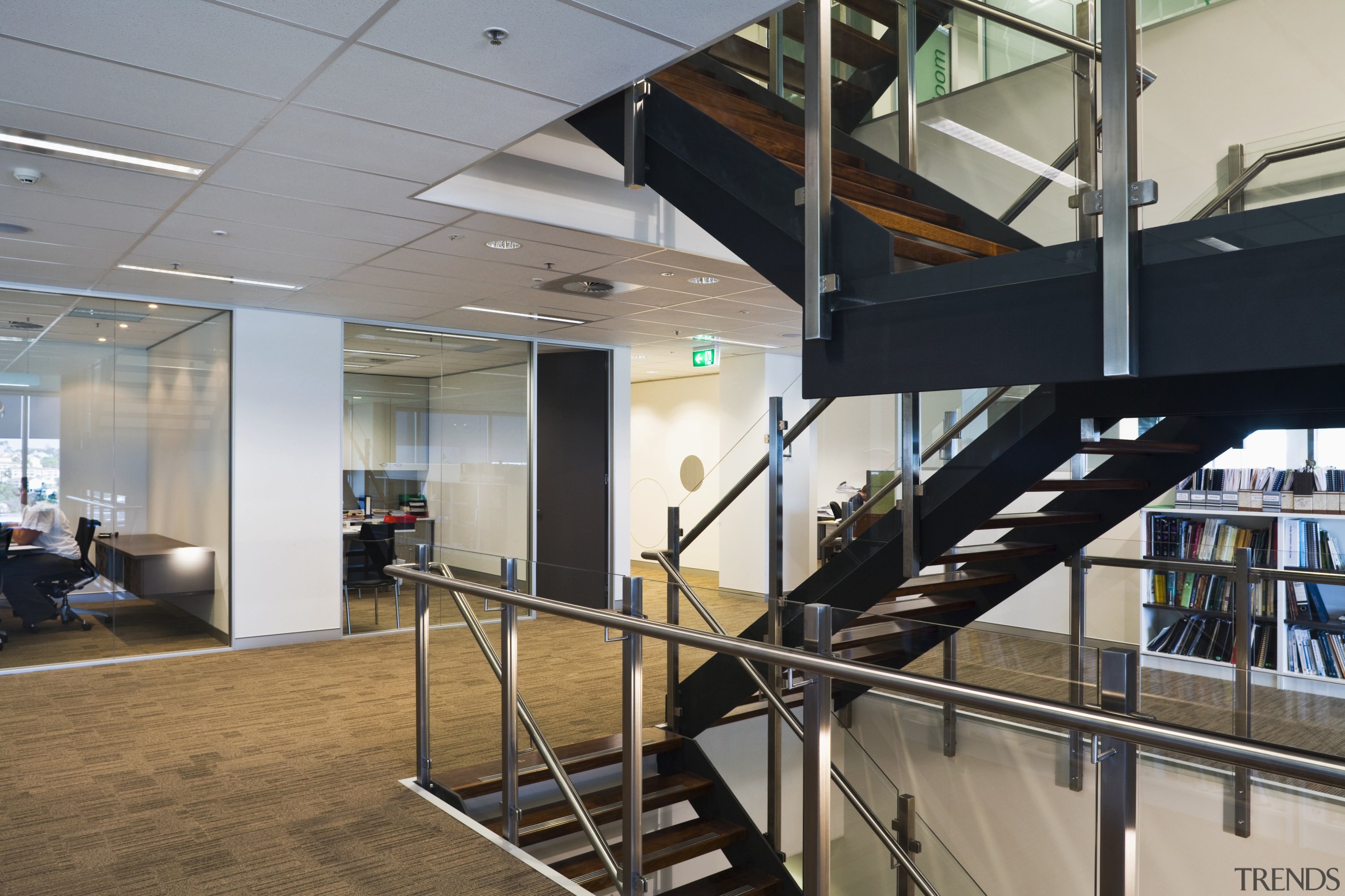 Harry Poulos Architecture created the interiors of the glass, interior design, lobby, gray, black