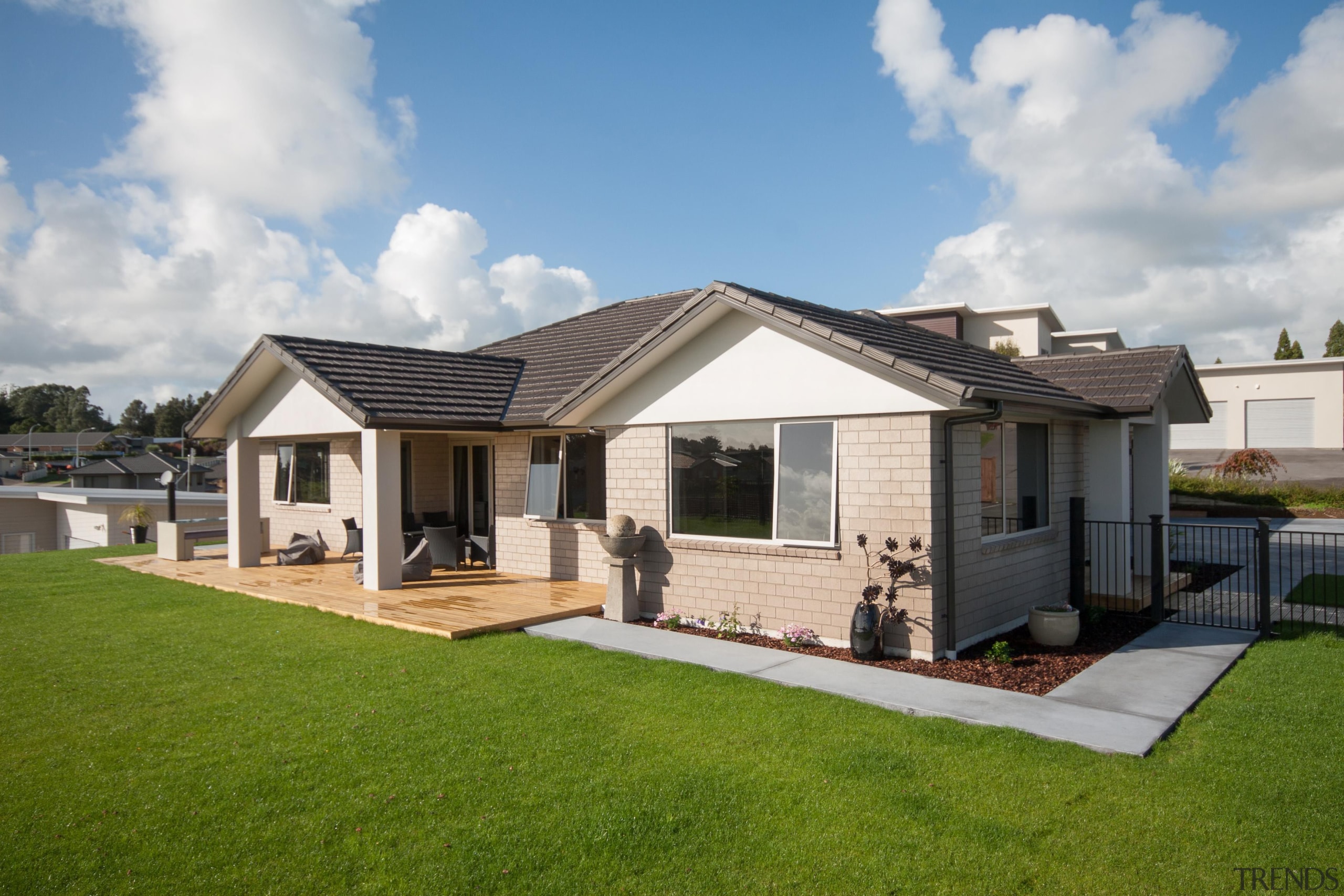 True low maintenance material home For more information, backyard, cottage, elevation, estate, facade, home, house, property, real estate, residential area, roof, siding, villa, yard, brown