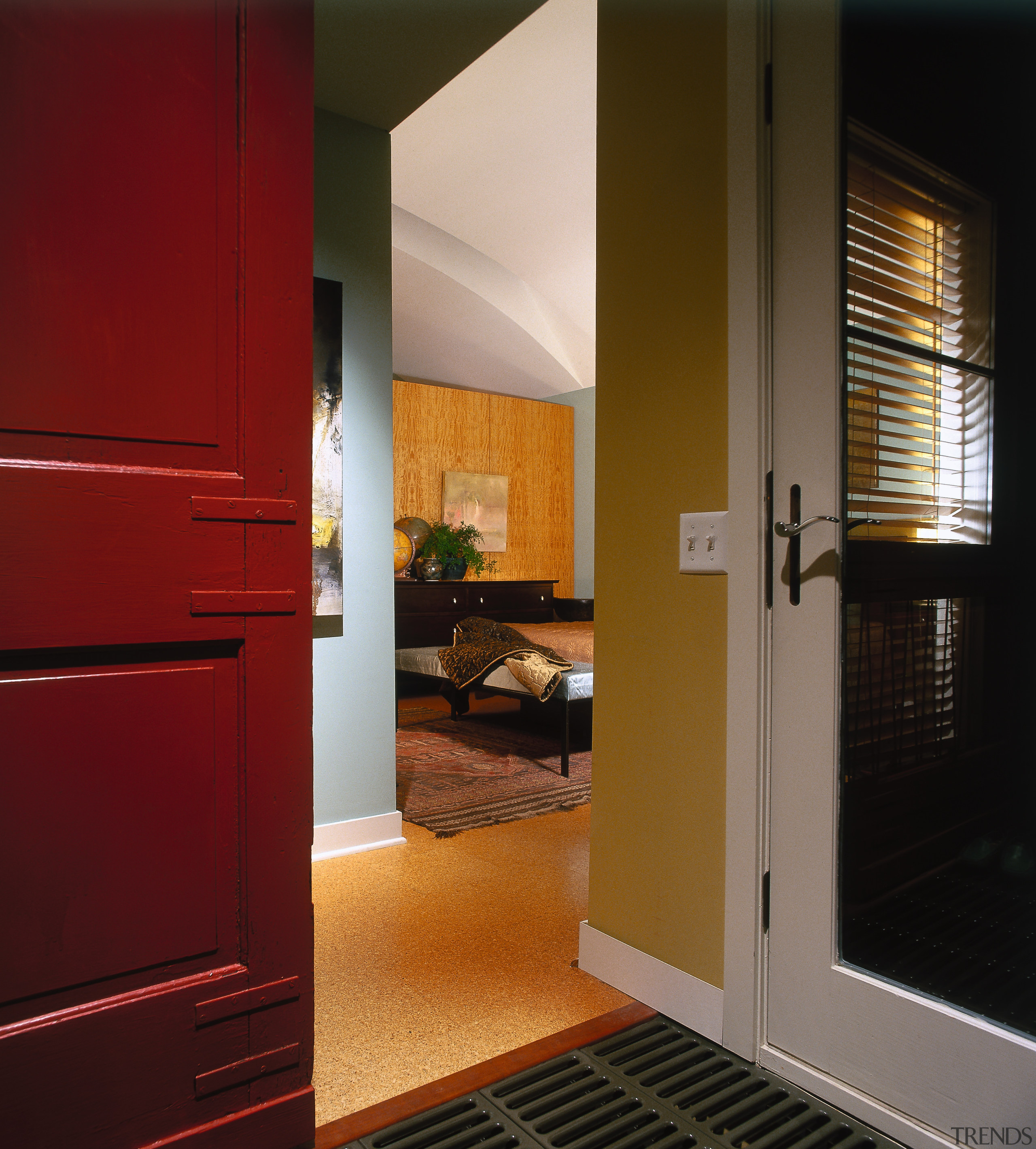 View of a red sliding panel door to cabinetry, ceiling, door, floor, flooring, hardwood, home, interior design, room, wall, window, wood, wood flooring, red, brown