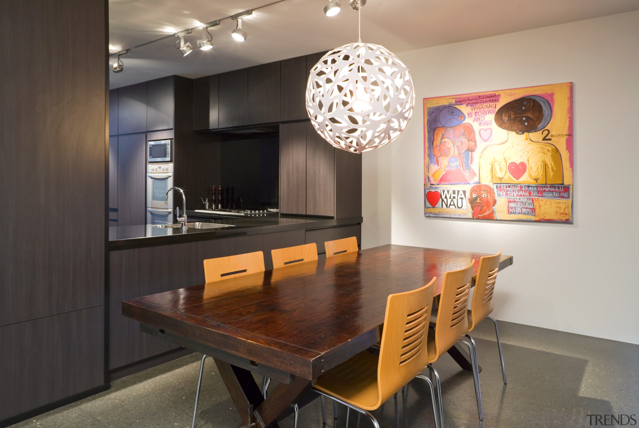 Dining room and kitchen inside contemporary home featuring ceiling, dining room, furniture, interior design, room, table, black, gray