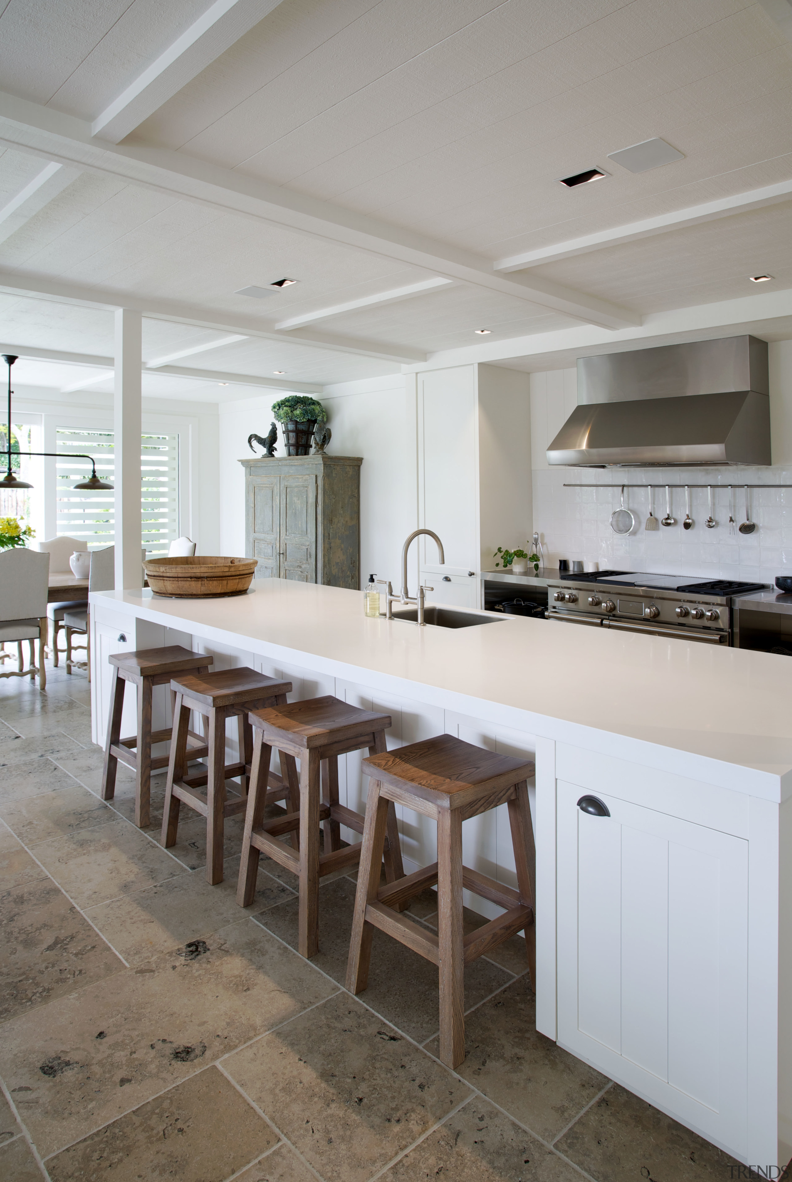 A panelled ceiling adds to the sense of countertop, cuisine classique, floor, flooring, interior design, kitchen, room, table, gray