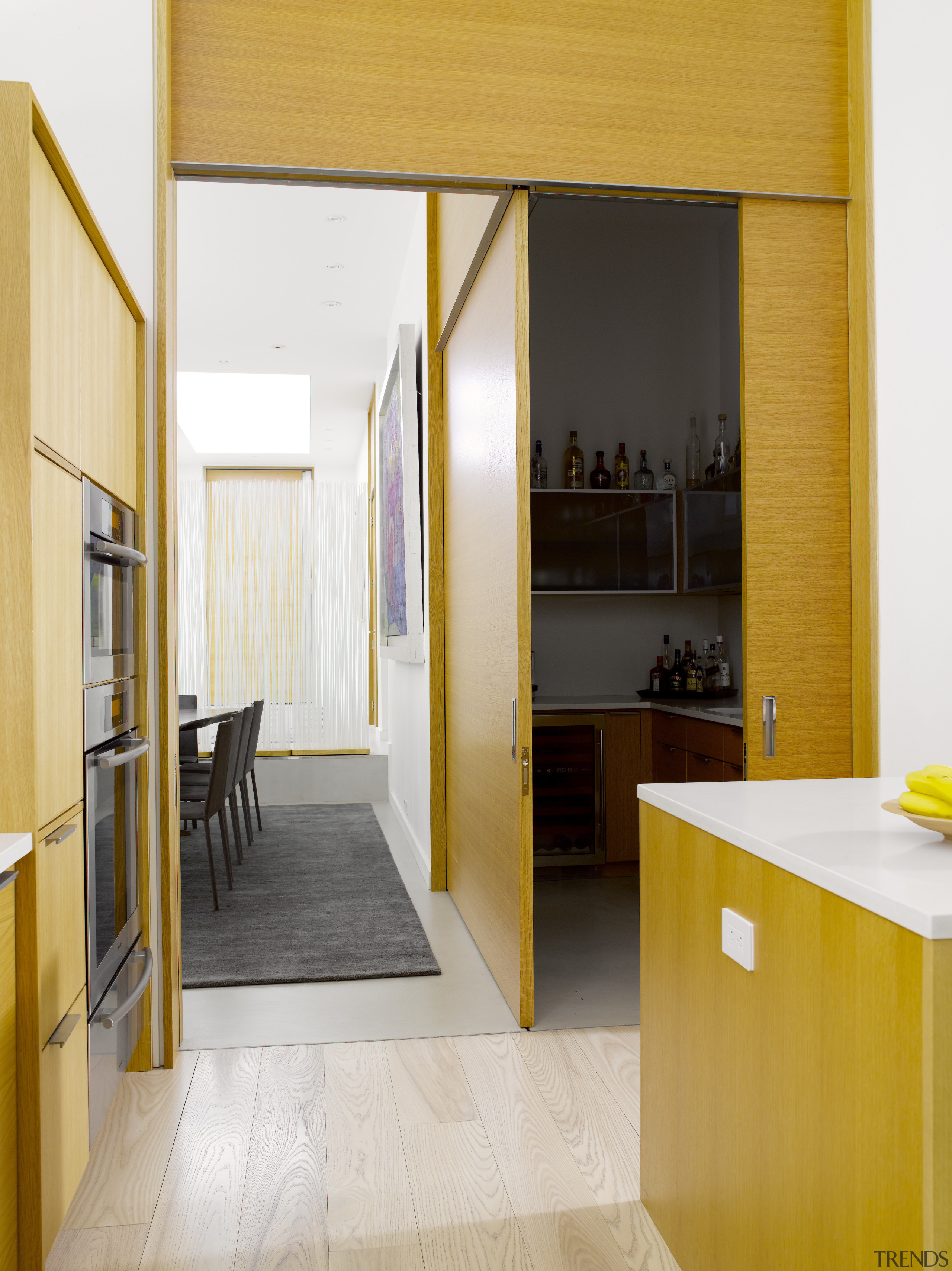 Seen here is a kitchen designed by Geoffrey architecture, door, floor, flooring, house, interior design, orange, white