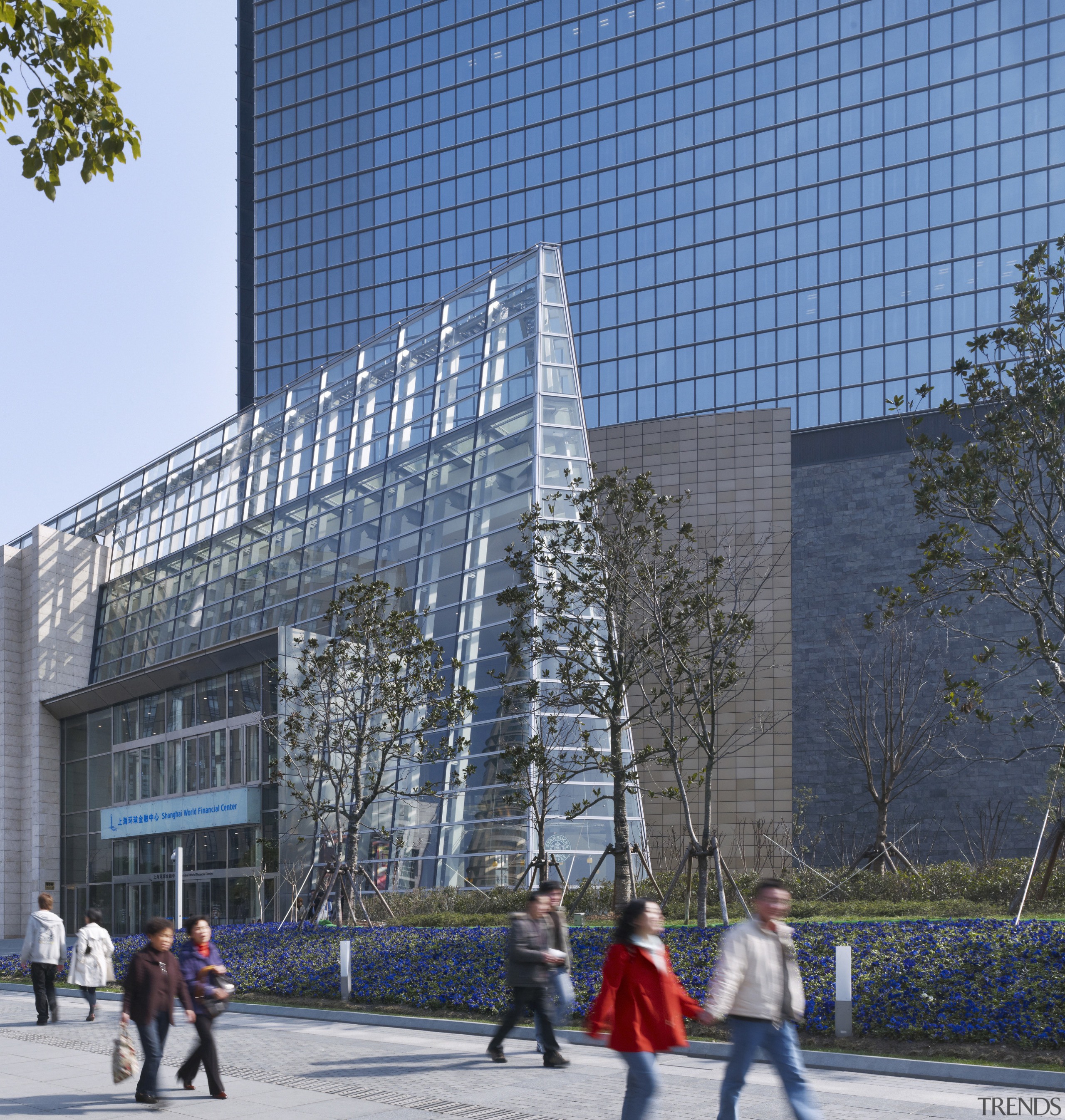 Exterior view of the front entrance which features architecture, building, city, corporate headquarters, daytime, downtown, headquarters, landmark, metropolis, metropolitan area, mixed use, plaza, sky, skyscraper, structure, tourist attraction, tower block, tree, urban area