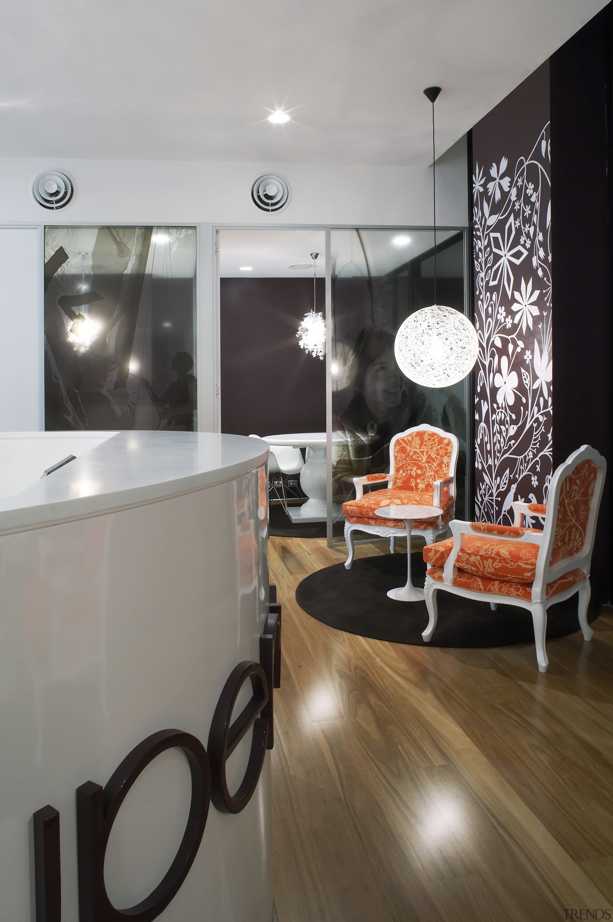 view of the reception area of the SuperWoman ceiling, floor, flooring, furniture, interior design, living room, room, table, gray