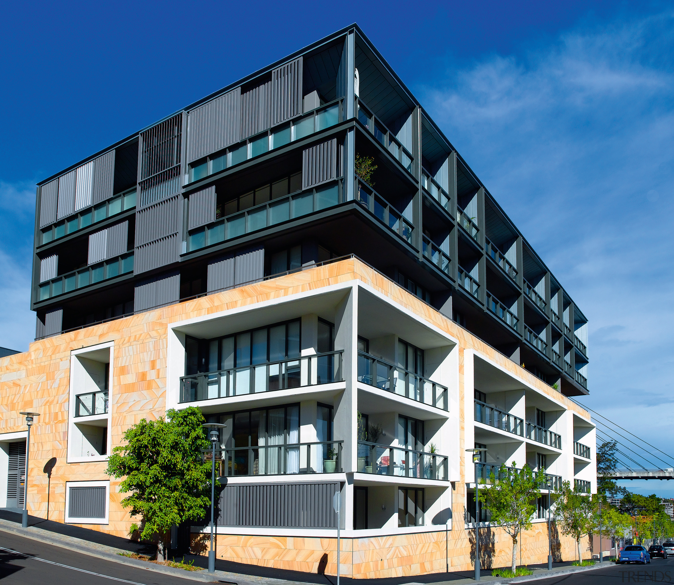 Exterior view of apartment building on corner site, apartment, architecture, building, commercial building, condominium, corporate headquarters, elevation, facade, home, house, metropolitan area, mixed use, neighbourhood, property, real estate, residential area