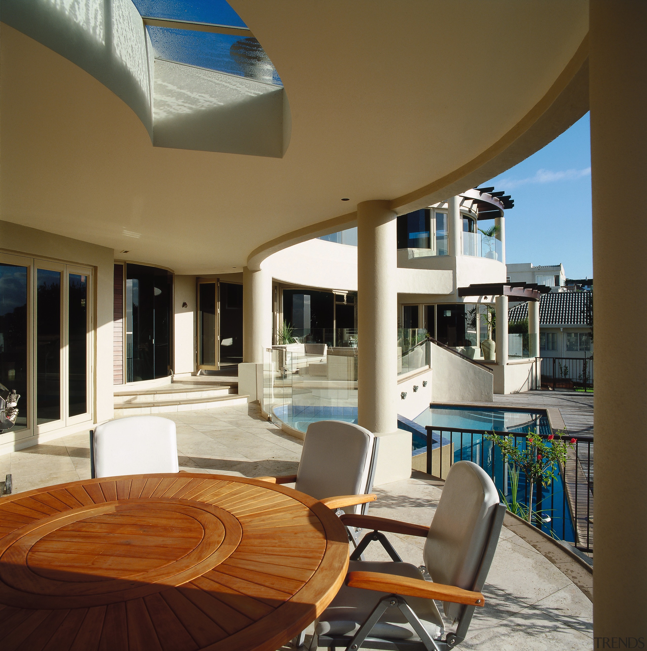 A view of the pool and patio areas, apartment, architecture, ceiling, daylighting, estate, house, interior design, living room, penthouse apartment, real estate, window, brown