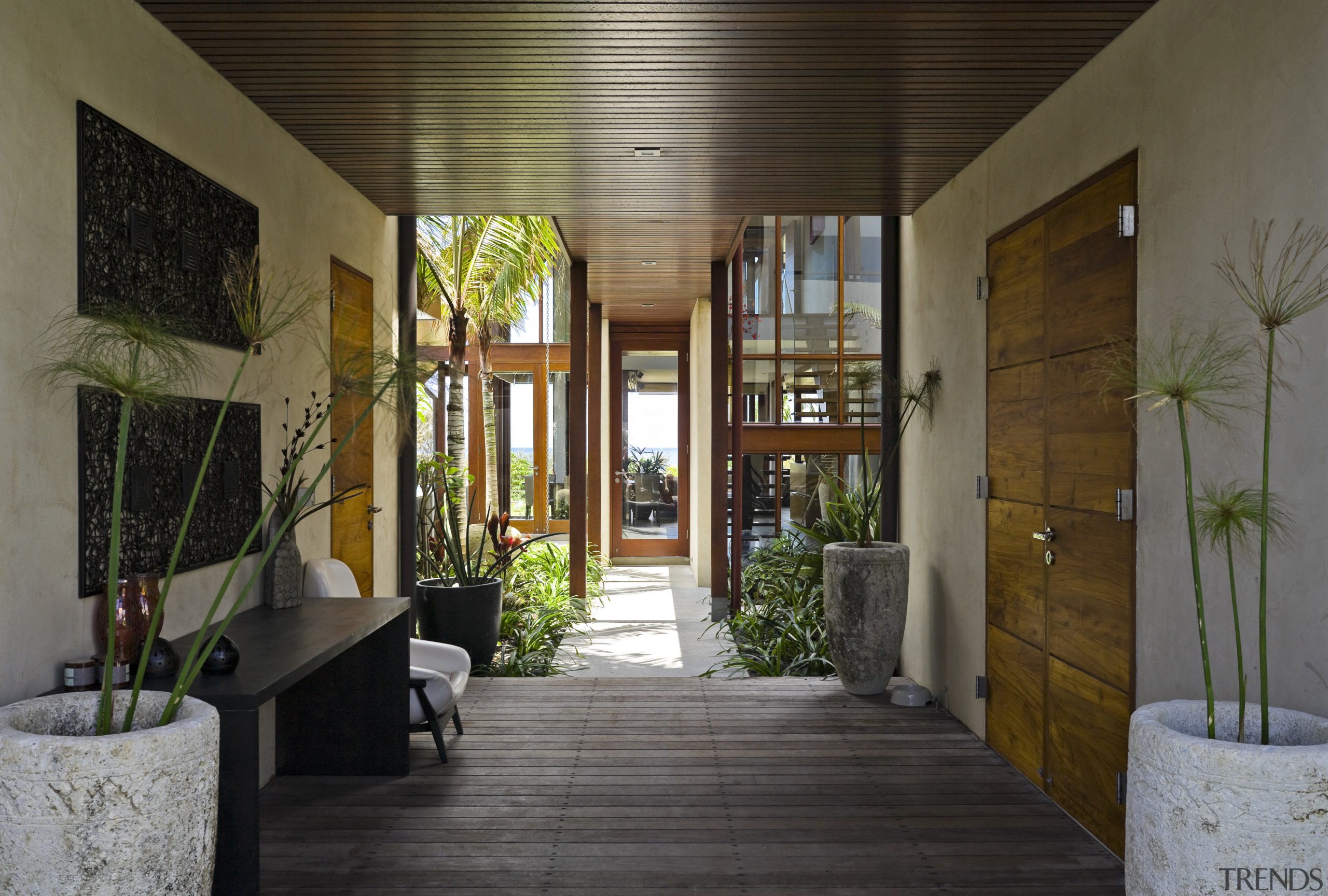 View of the covered breezeway which runs from courtyard, home, house, interior design, brown, gray