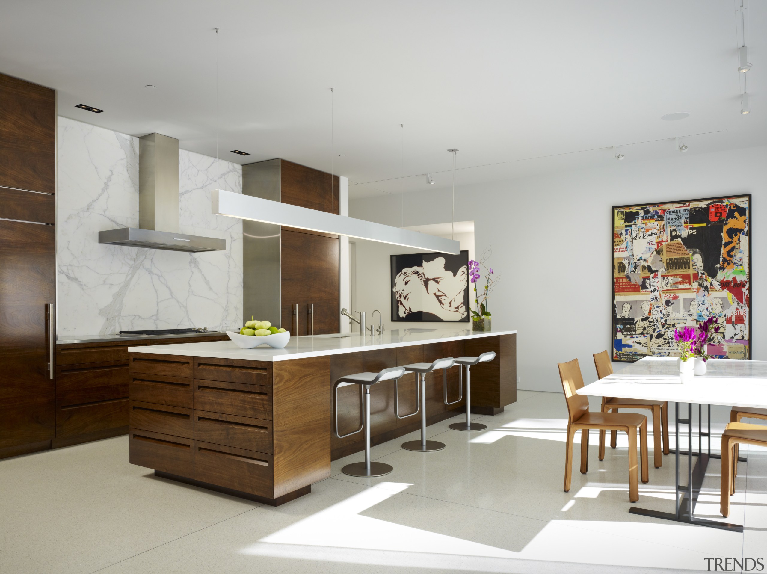 The artwork in the kitchen is by Jacques furniture, interior design, kitchen, product design, table, gray