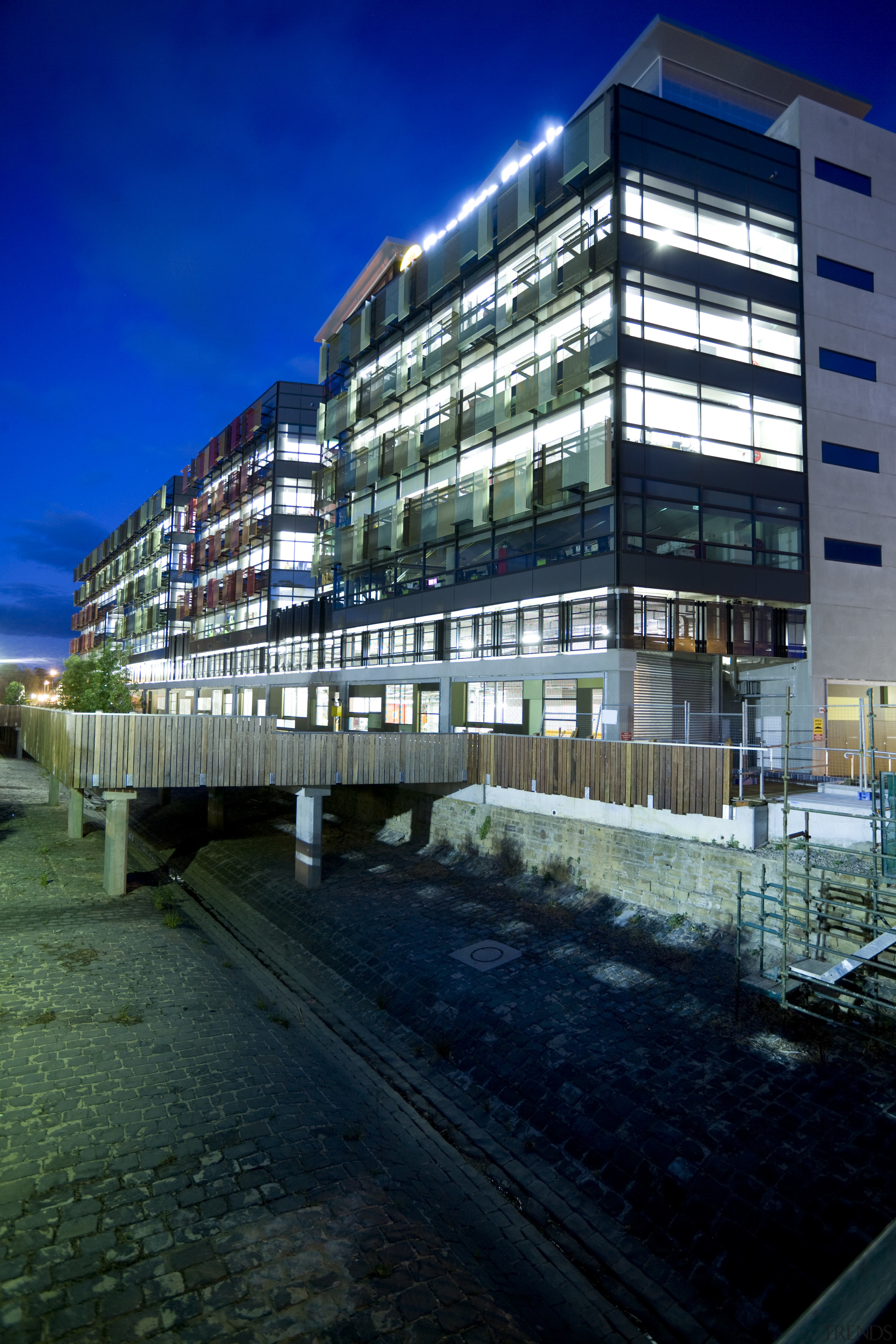 Exterior view of the Bendigo Bank sustainable building apartment, architecture, building, city, commercial building, condominium, corporate headquarters, facade, headquarters, home, hotel, house, metropolis, metropolitan area, mixed use, night, real estate, reflection, residential area, sky, tower block, urban area, black, blue