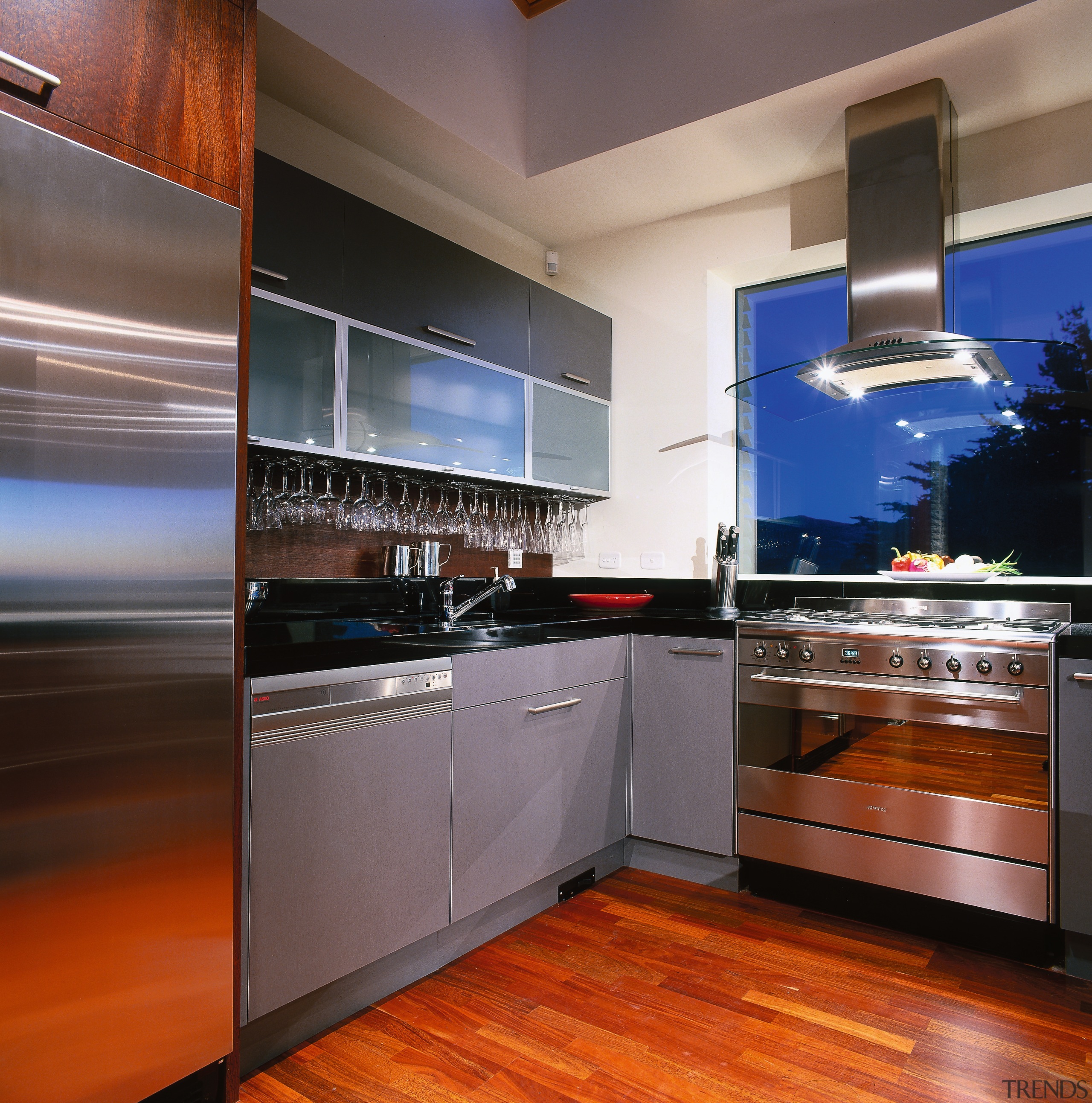 view of kitchen area sowing wood flooring, stainless apartment, cabinetry, countertop, hardwood, home, interior design, kitchen, property, real estate, room, under cabinet lighting, gray