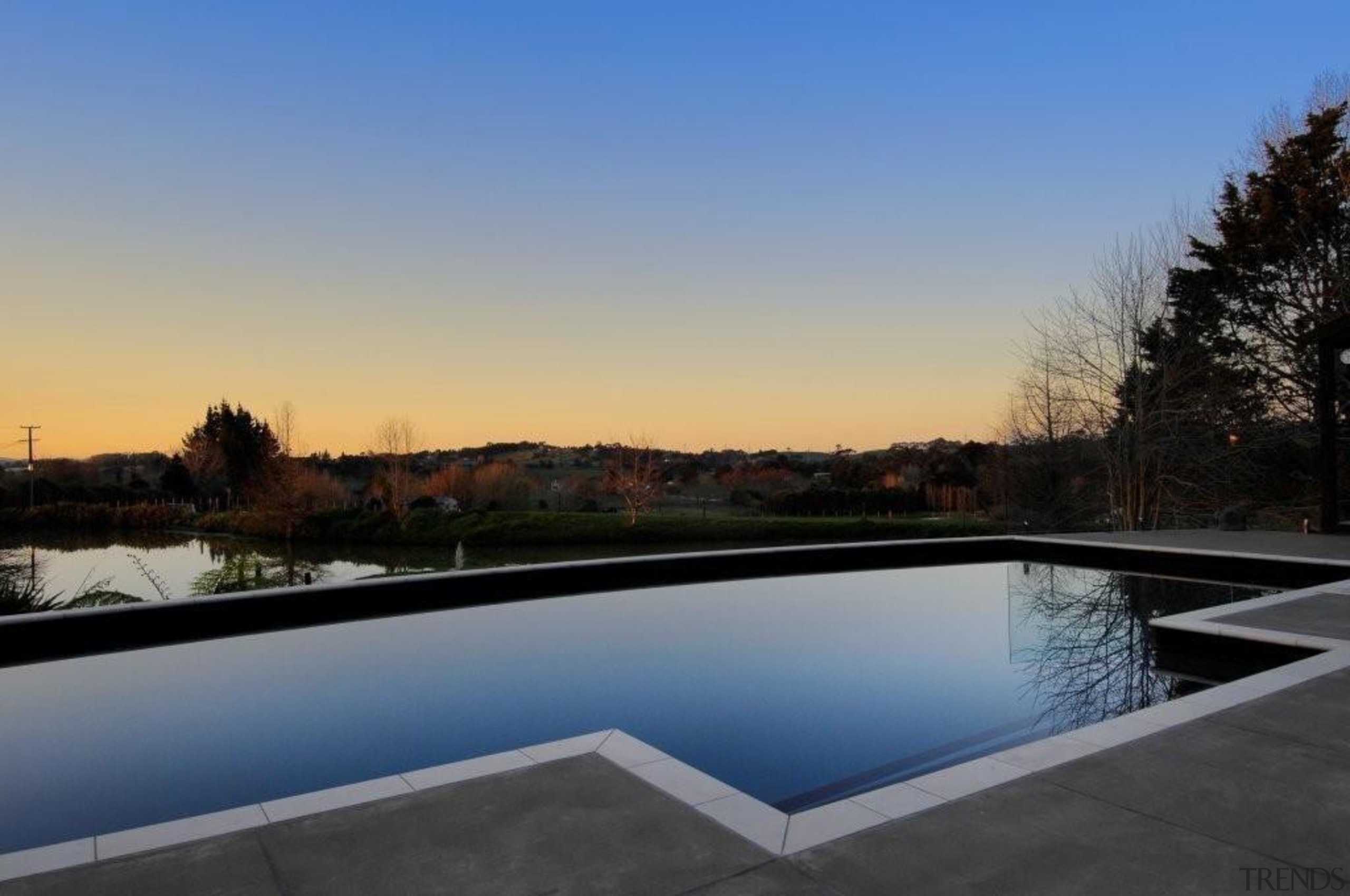 Concrete swimming pool dusk shot - private residence architecture, estate, home, house, lighting, property, real estate, reflecting pool, reflection, residential area, roof, sky, swimming pool, water, black