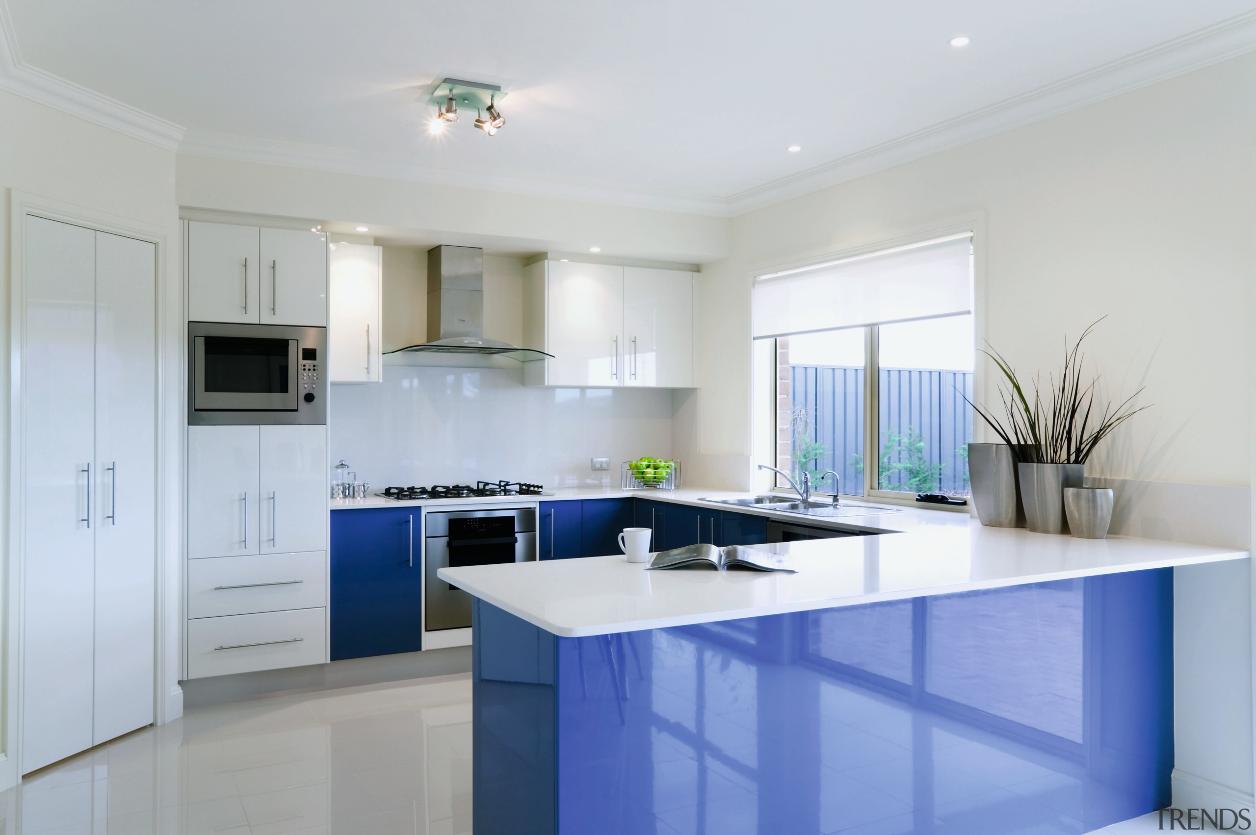 A view of a home designed by Domaine cabinetry, countertop, cuisine classique, interior design, kitchen, property, real estate, room, gray, white