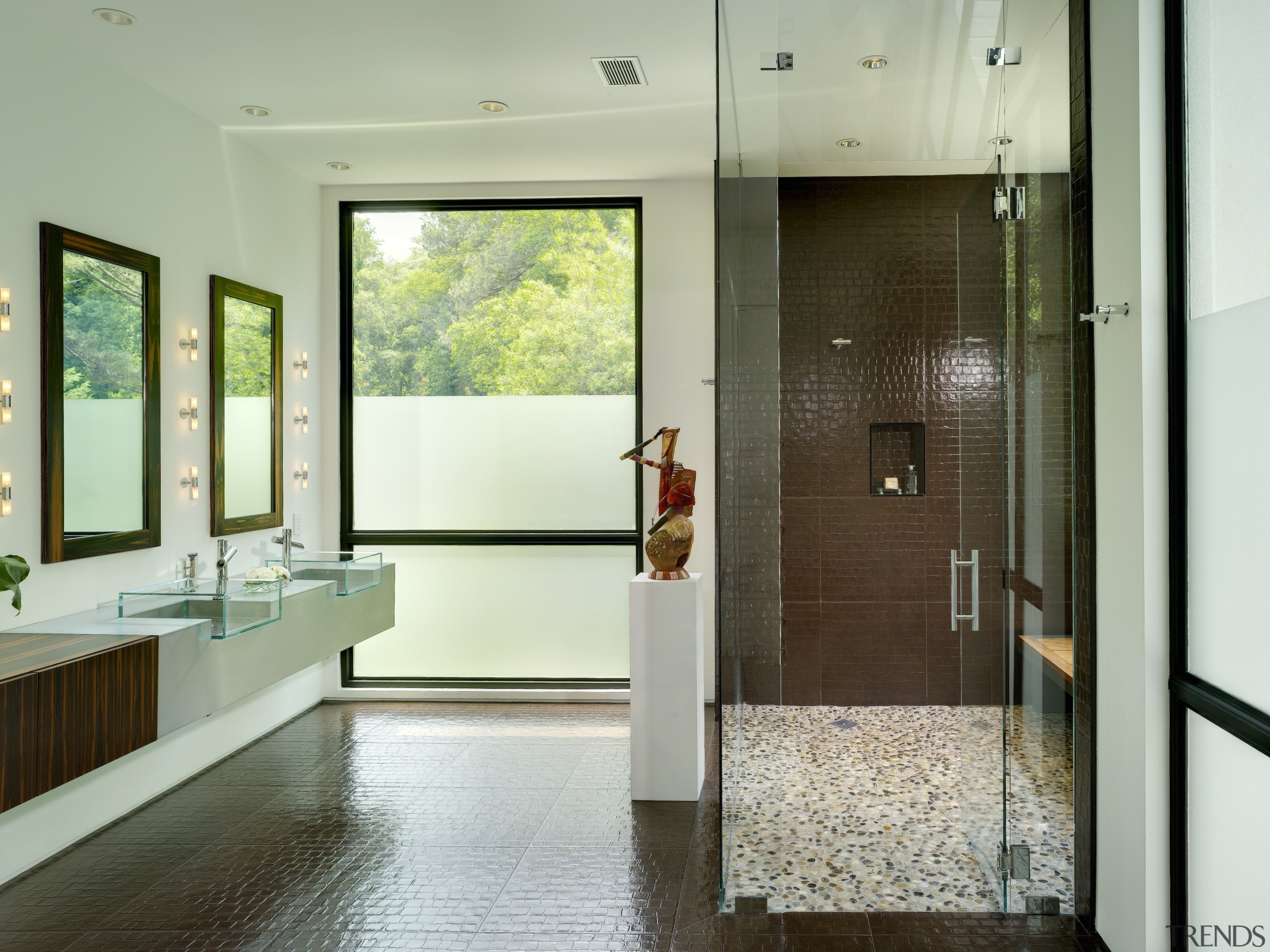 View of bathroom with brown wall and floor bathroom, door, floor, flooring, interior design, room, gray