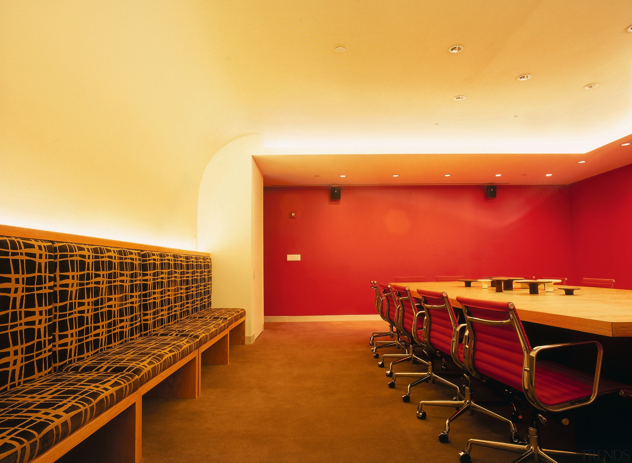 A view of the confrence room, carpet, cream architecture, auditorium, ceiling, conference hall, floor, flooring, function hall, interior design, lighting, table, wall, orange