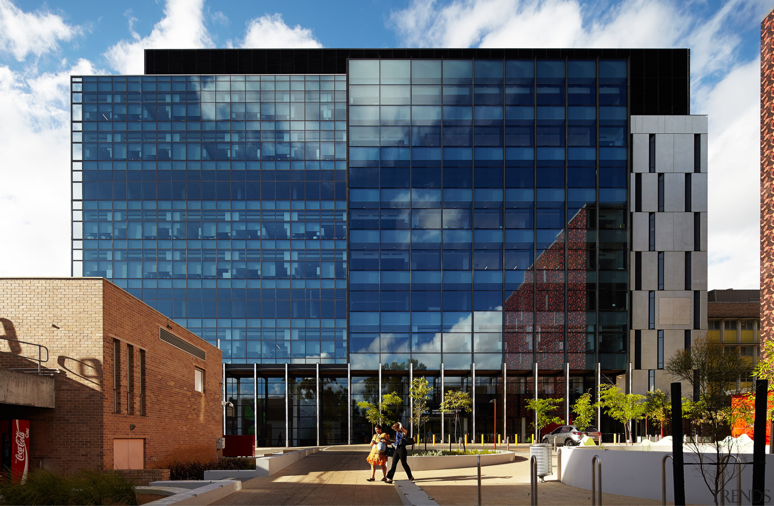 The precast concrete facade of the Harry Perkins architecture, building, city, commercial building, condominium, corporate headquarters, daytime, facade, headquarters, metropolis, metropolitan area, mixed use, neighbourhood, real estate, residential area, sky, urban area, window