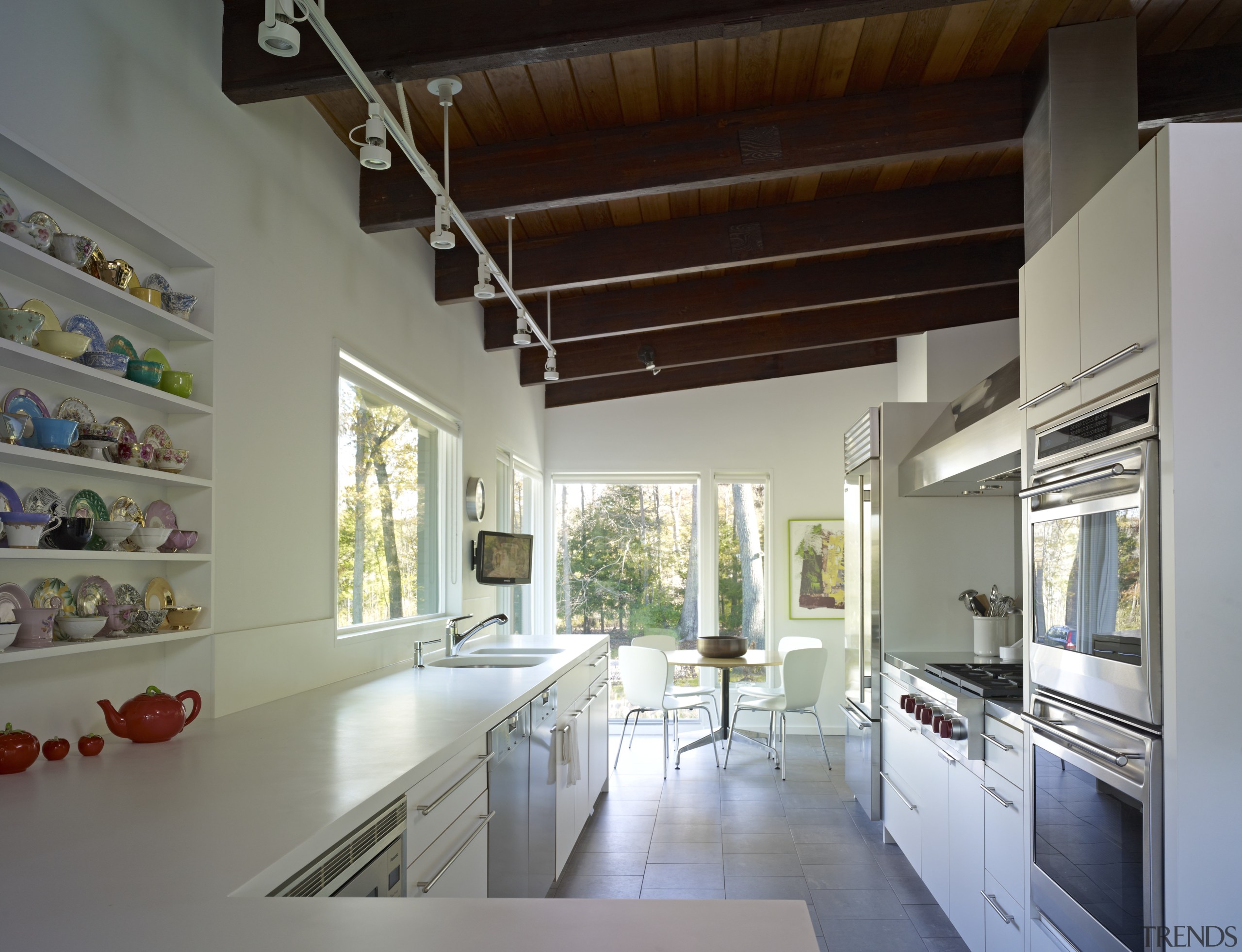This new kitchen in a remodeled house incorporates ceiling, countertop, interior design, kitchen, real estate, gray