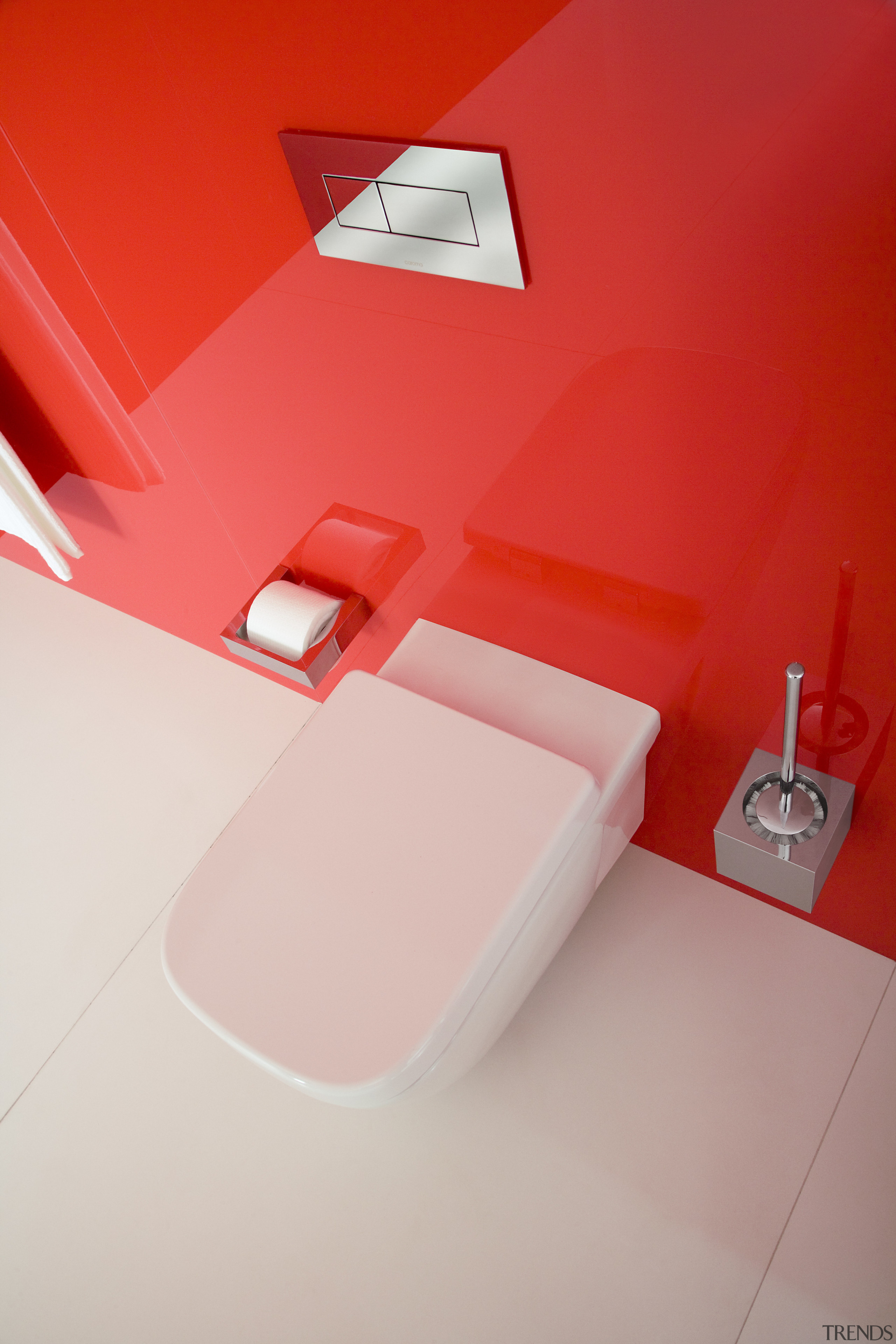 View of a bathroom designed by Ian Moore angle, bathroom, design, floor, interior design, light, line, orange, pink, plumbing fixture, product design, red, room, sink, tap, toilet, toilet seat, red, gray