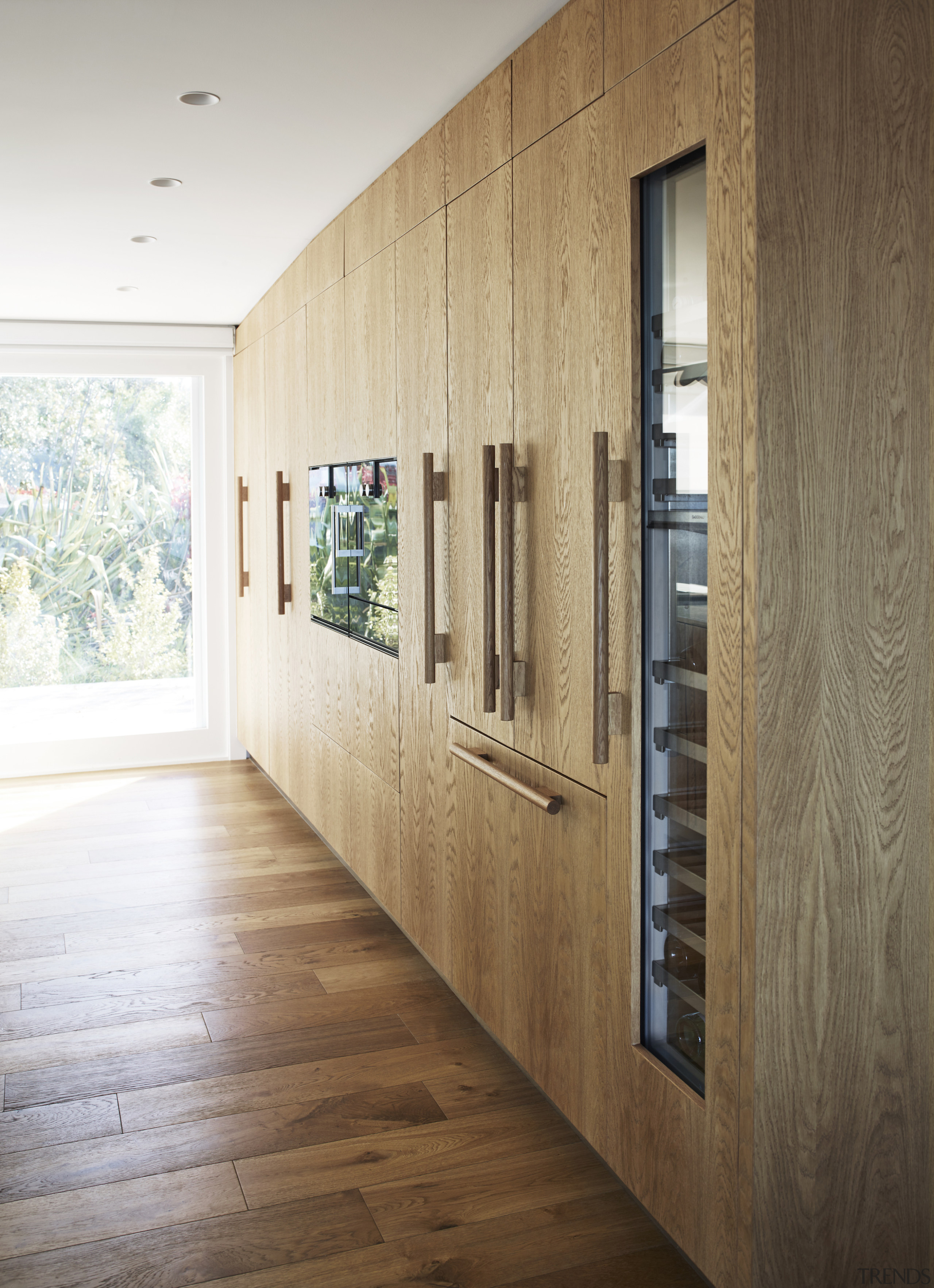 The rear wall of kitchen cabinetry is finished 