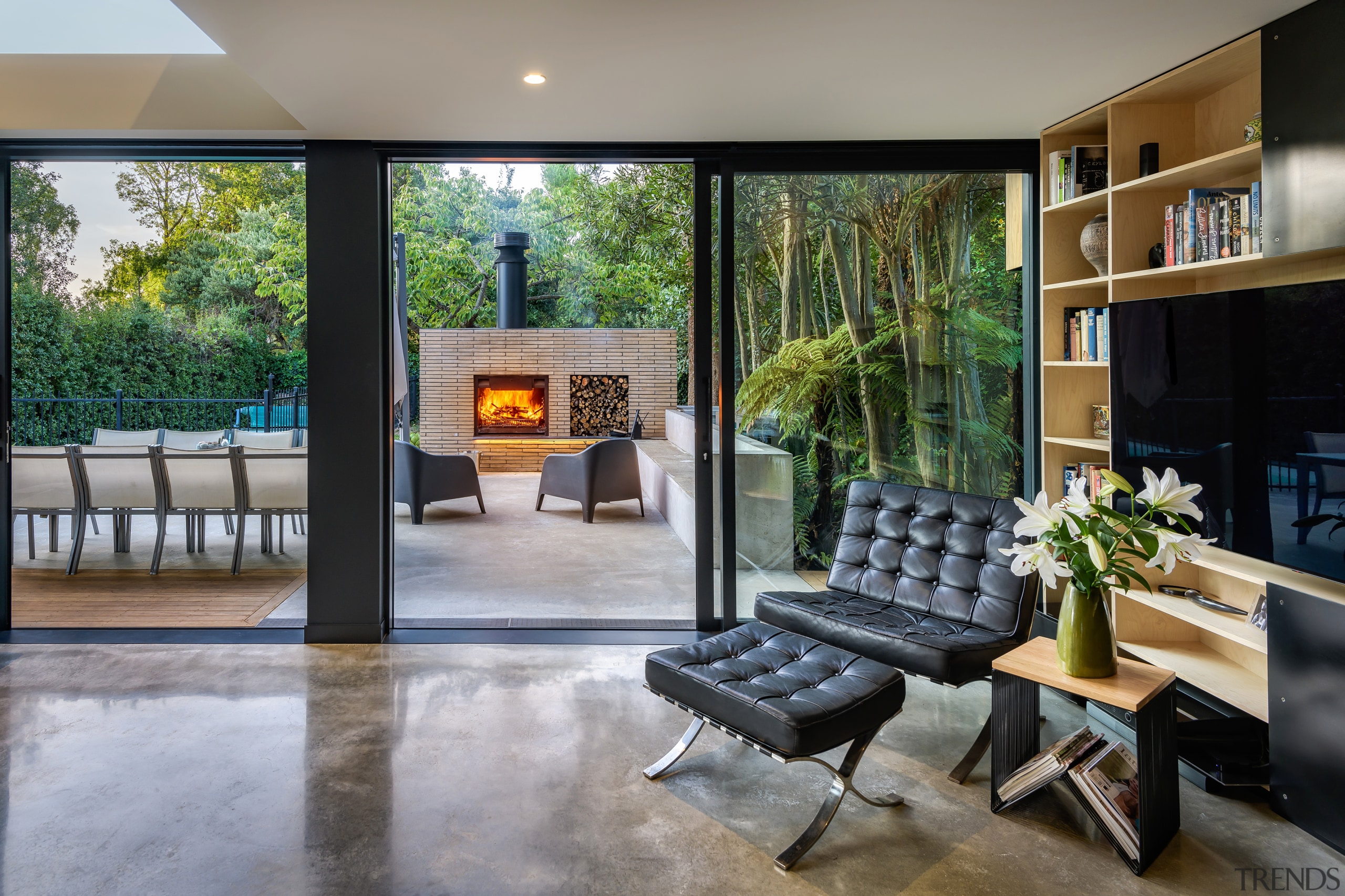 The double height living room looks out on 