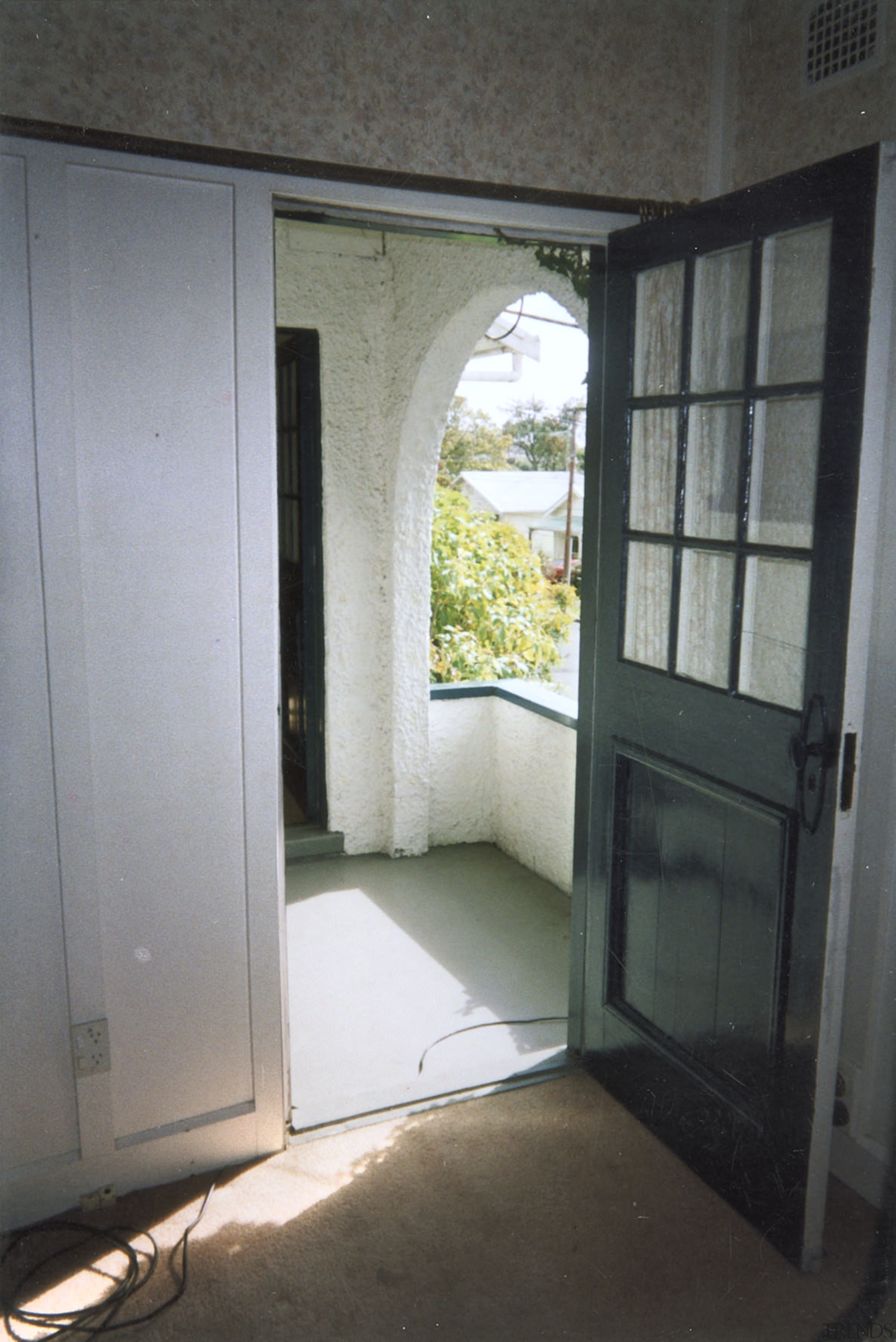 View of front door prior to renovations. - door, home, house, property, real estate, window, gray, black