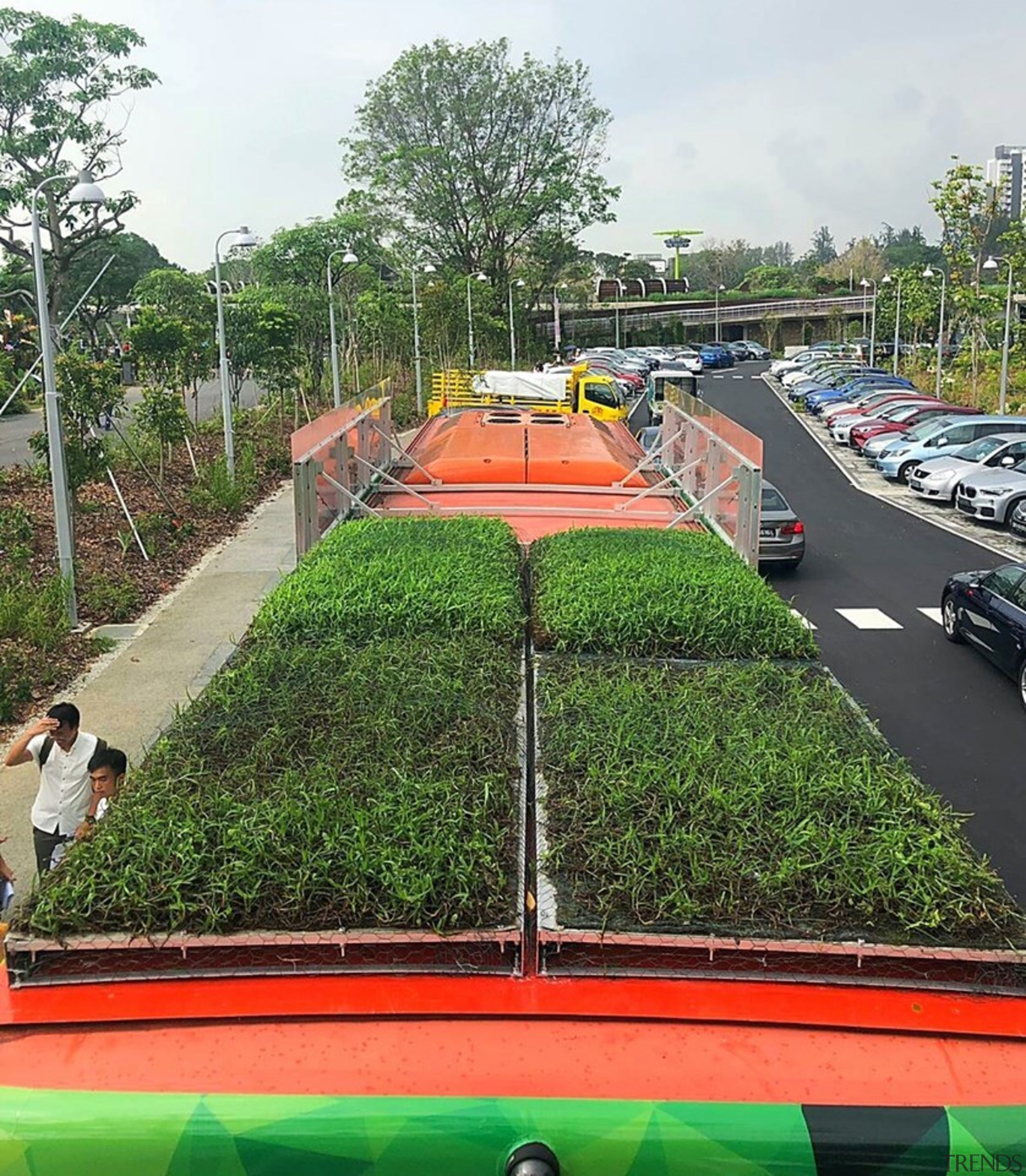 Outfitted with an innovative, locally developed and soil-less asphalt, grass, green, plant, road, shrub, transport, tree, vehicle