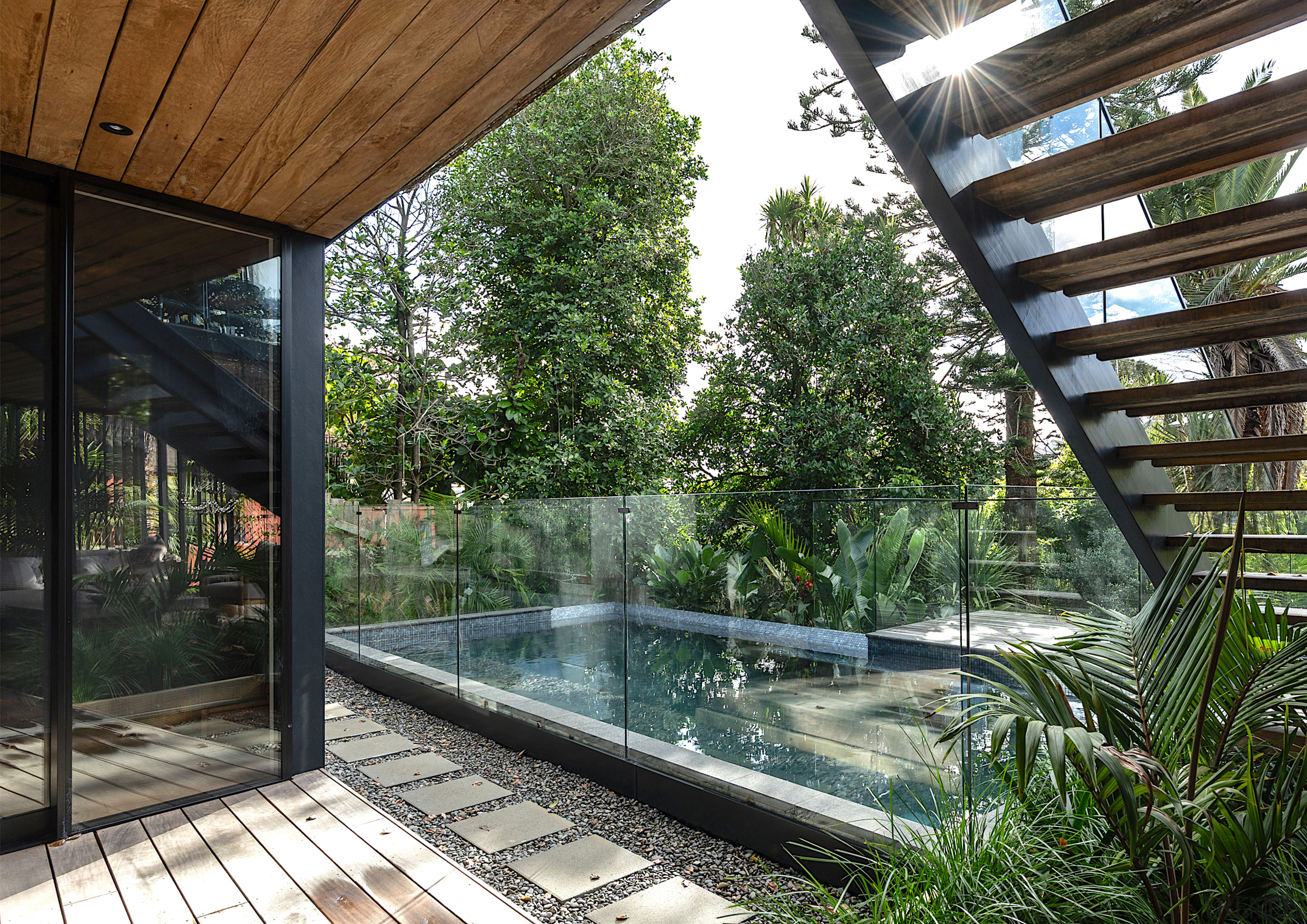 View of pool from sheltered ground floor deck. 