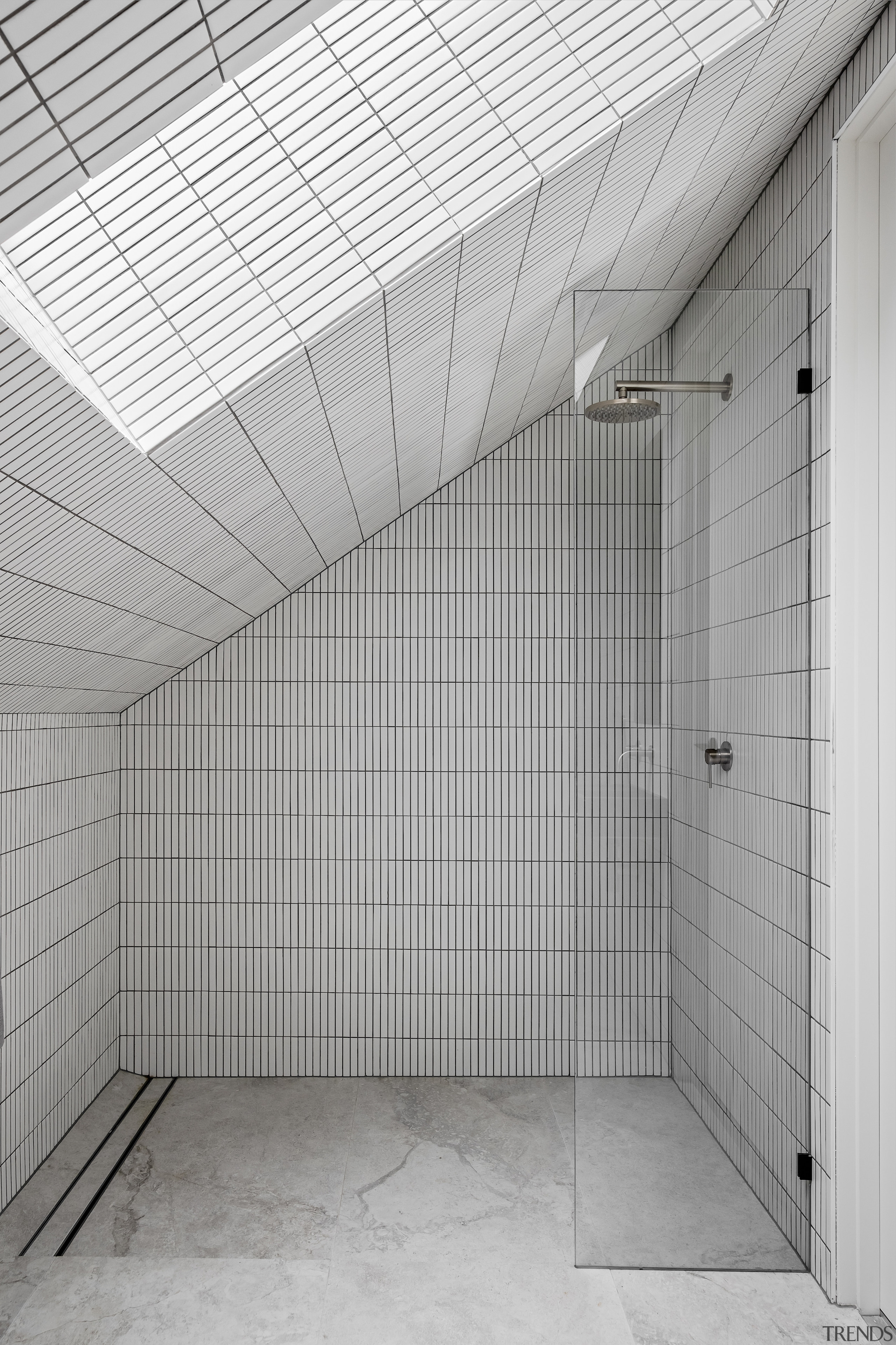 The bathroom in the loft embraces the natural 