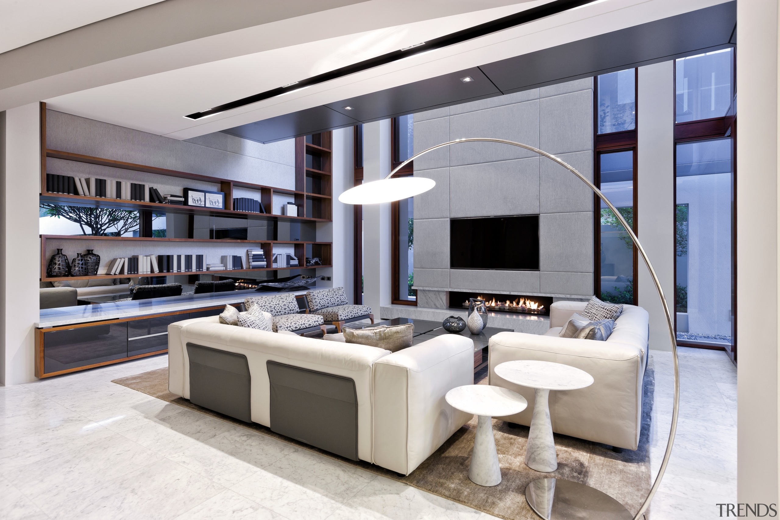 The double-height living room in this new home interior design, living room, white, gray