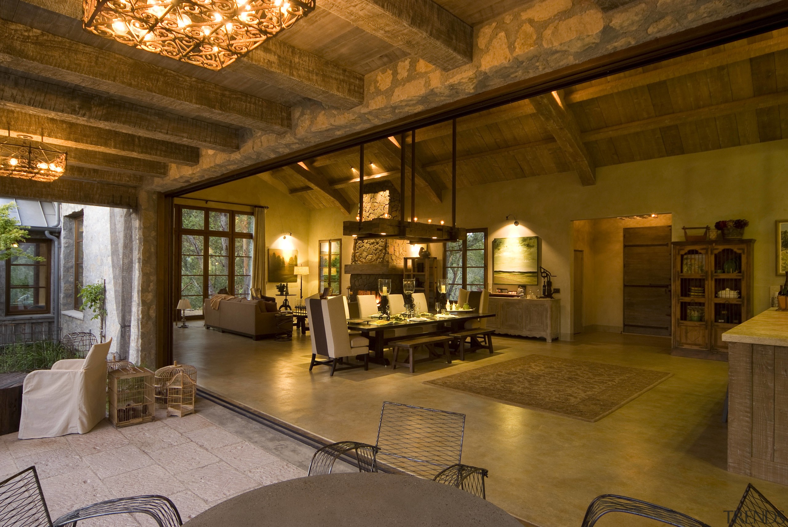 Rustic house modelled on French barn. Interiors feature beam, ceiling, estate, home, interior design, living room, lobby, real estate, room, brown