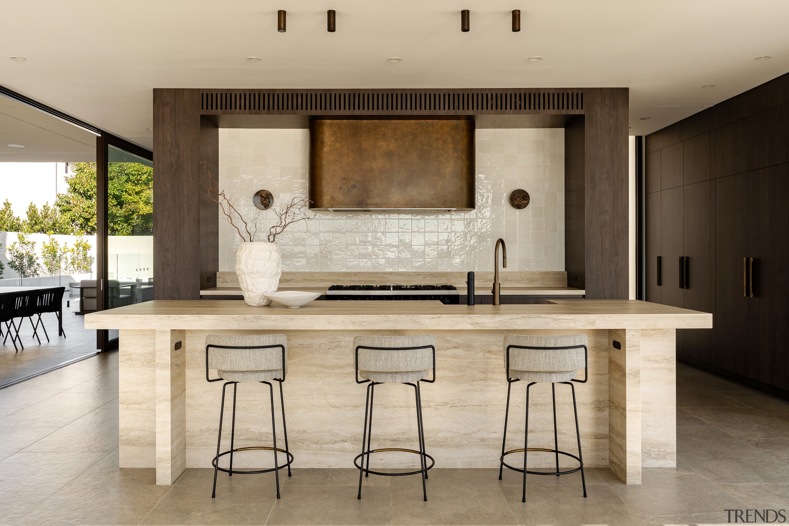 Echoing the home's timber and stone cladding, the 