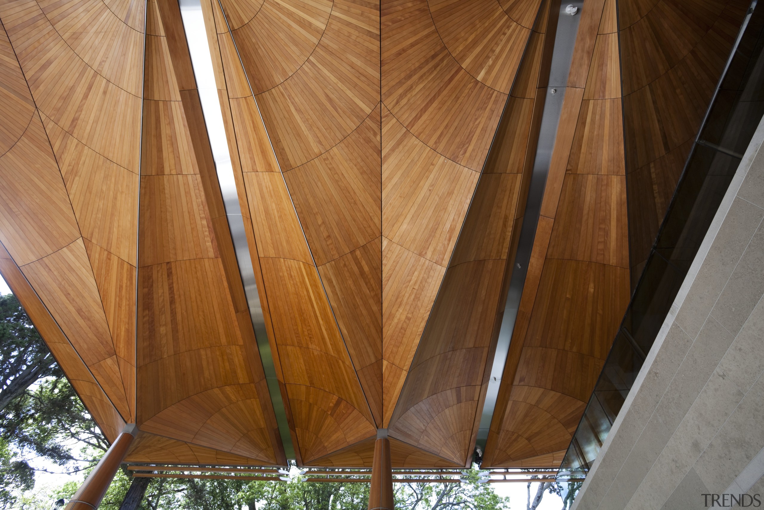 View of exterior facade of Auckland Art Gallery. architecture, beam, ceiling, daylighting, line, roof, structure, wood, brown, orange