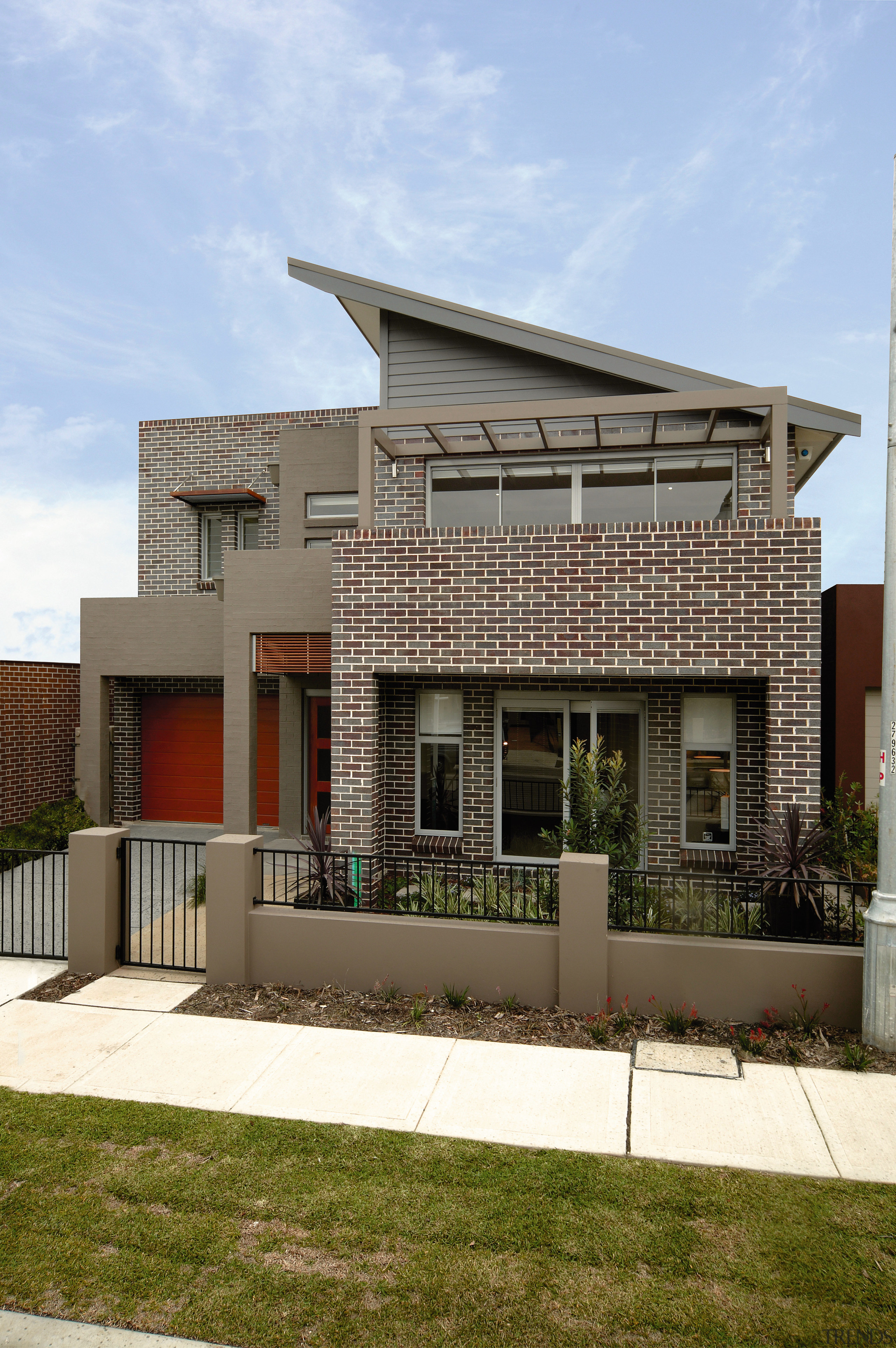 A view of some bricks from Midland Brick. architecture, building, elevation, facade, home, house, official residence, property, real estate, residential area, teal