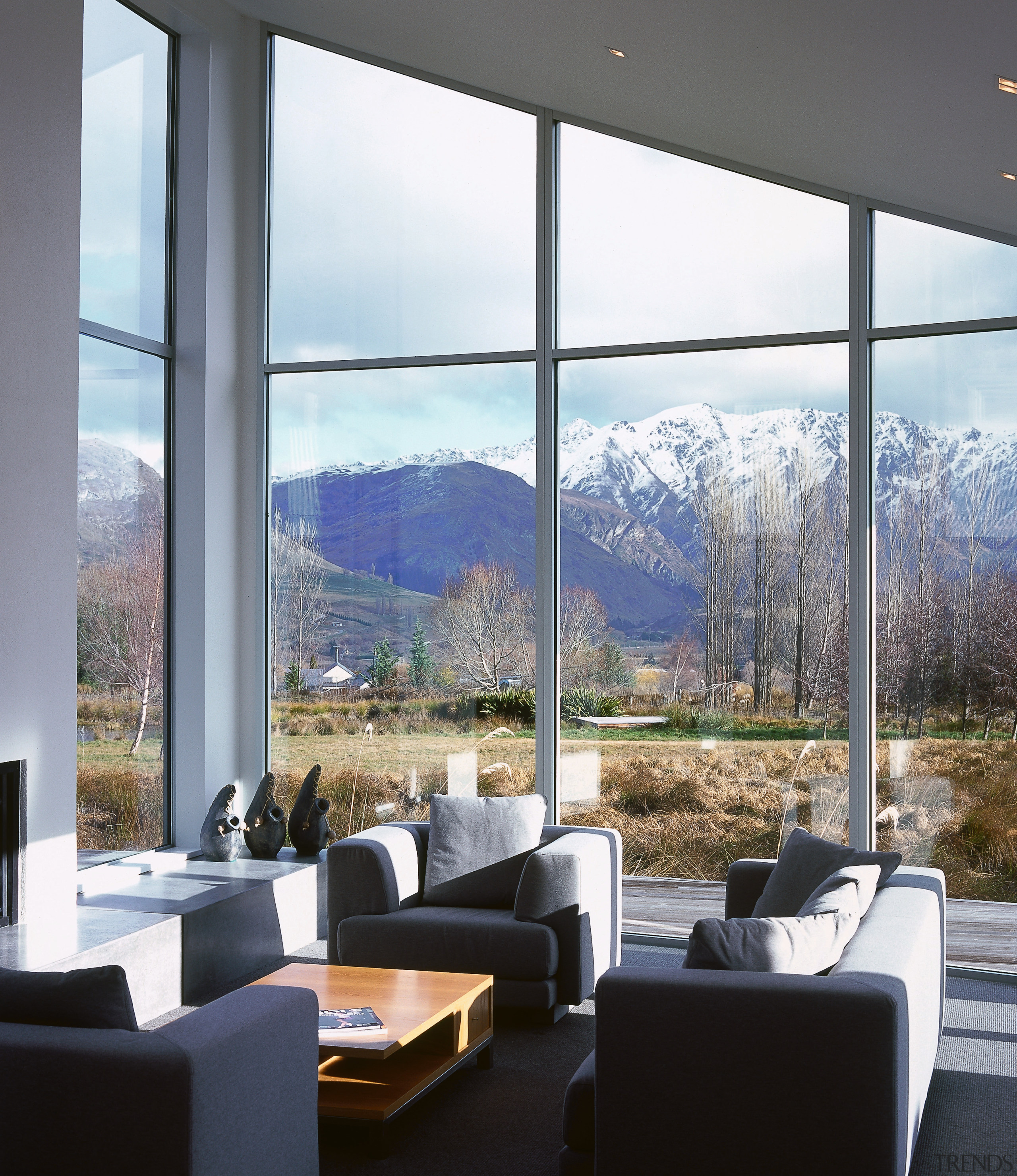 A view of the living area, grey carpet, architecture, daylighting, interior design, real estate, window, white, gray