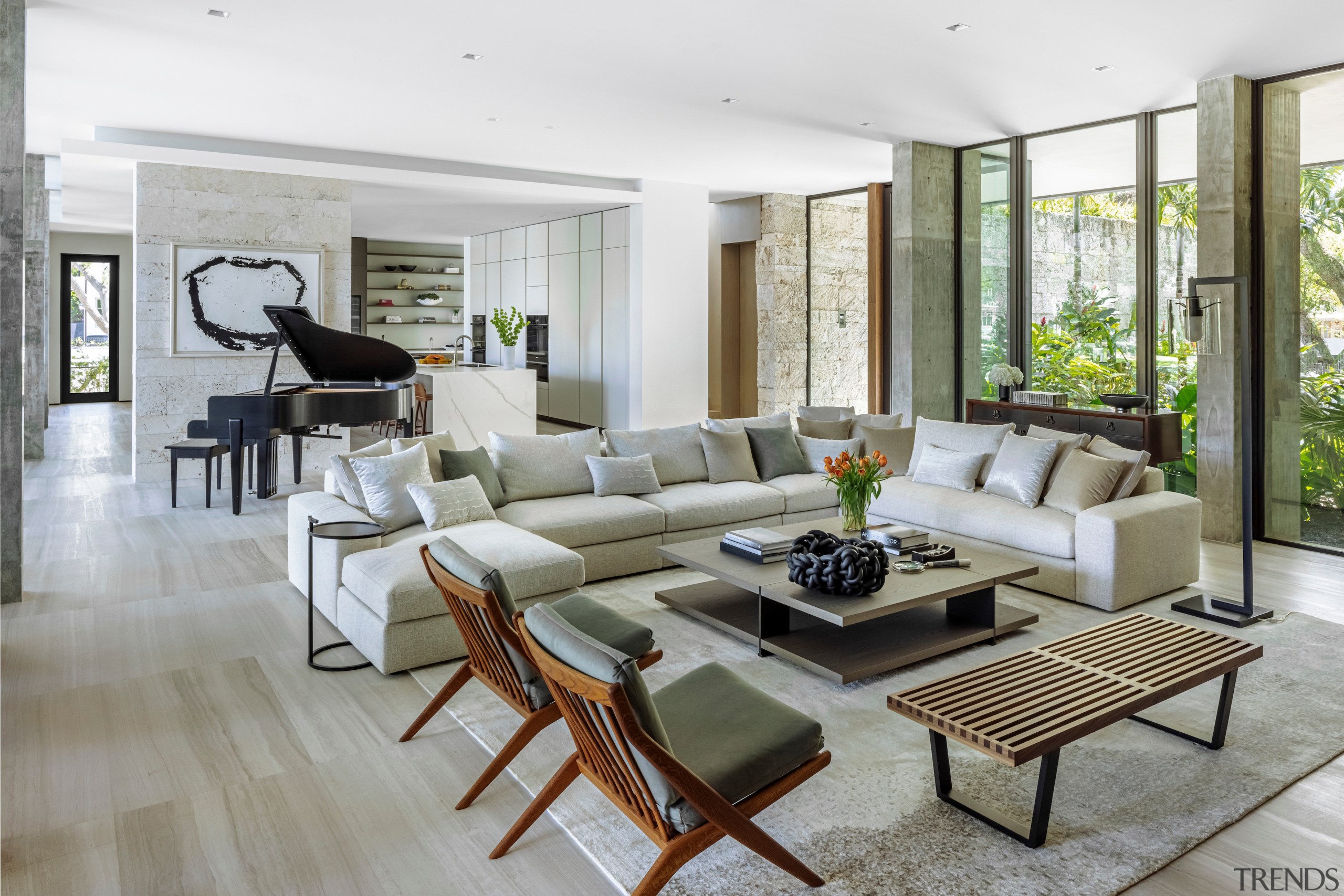 The open concept living space is surrounded by 