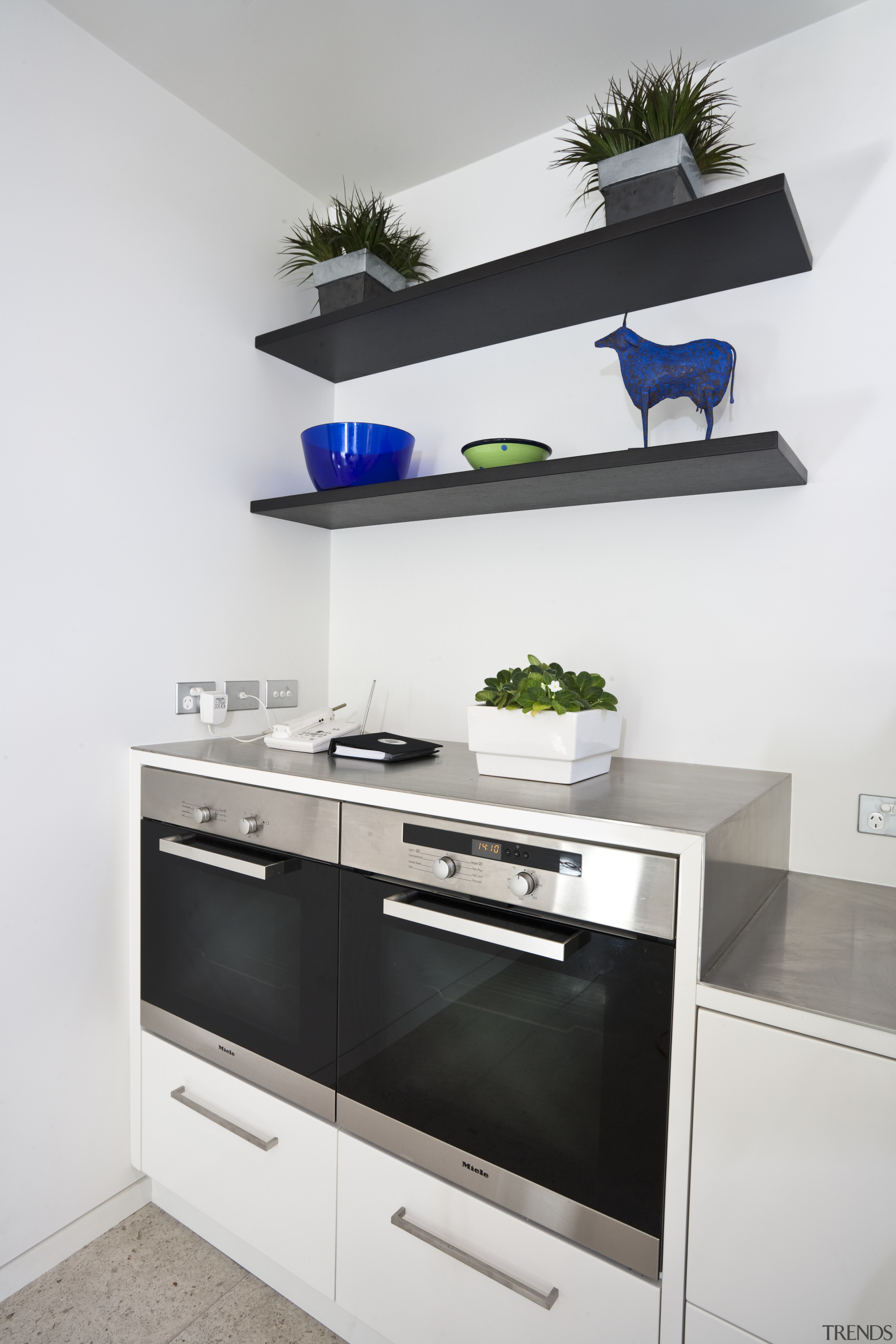 Modern kitchen features brilliant white panelling - Modern furniture, home appliance, interior design, kitchen, kitchen stove, product, product design, shelf, shelving, white