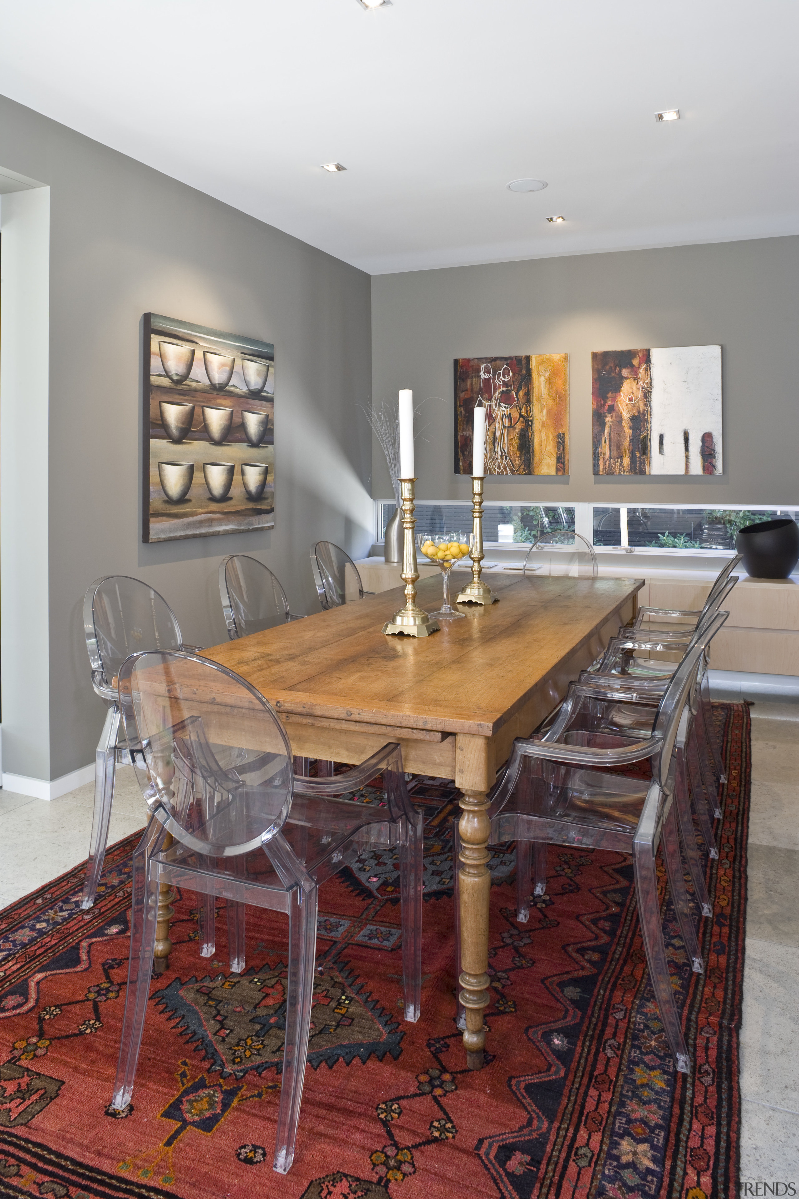 View of the dining area which features an ceiling, chair, dining room, floor, furniture, home, interior design, kitchen, living room, room, table, gray