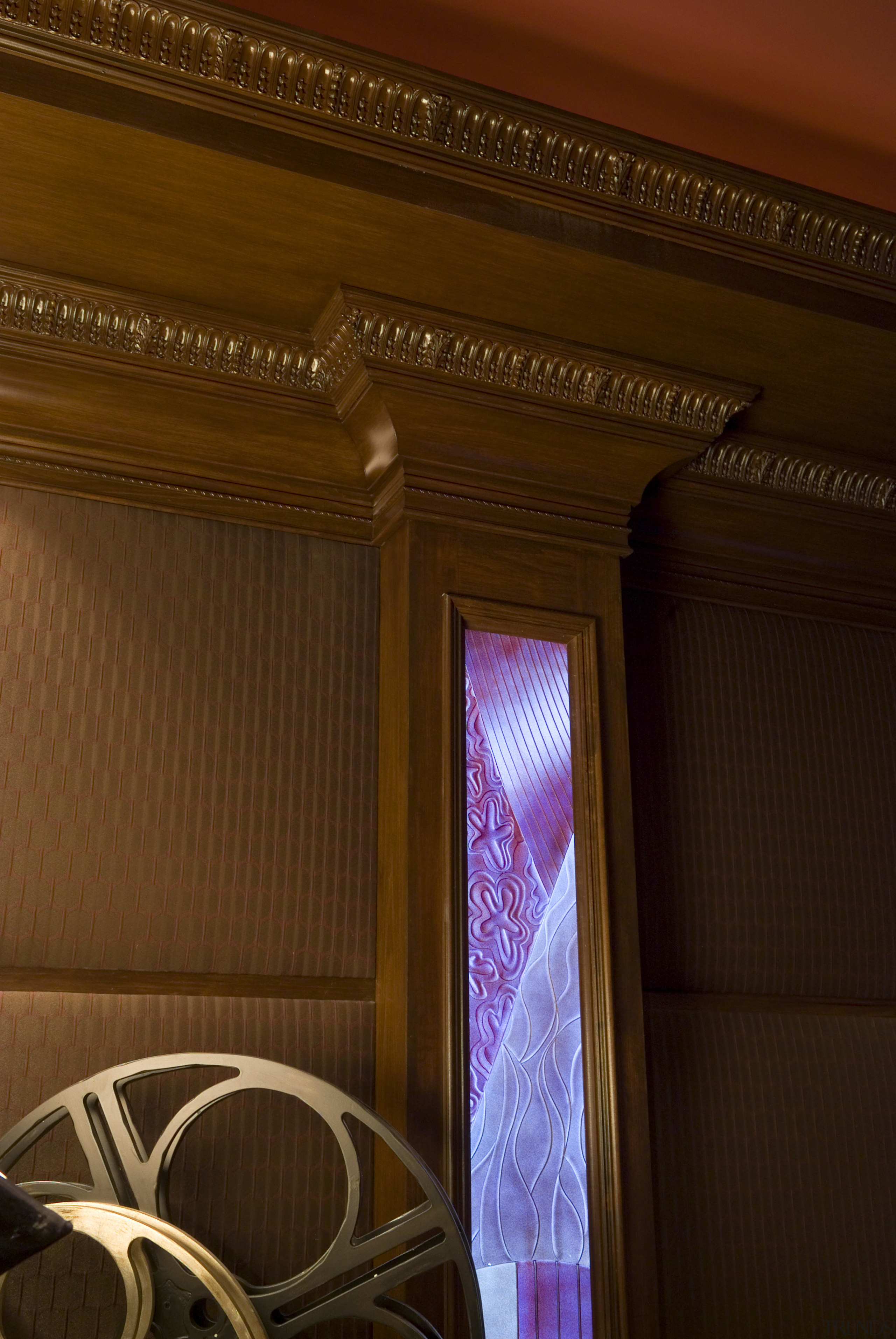 View of room with woodwork by Trim Tech. ceiling, column, interior design, light, light fixture, lighting, wall, wood, brown