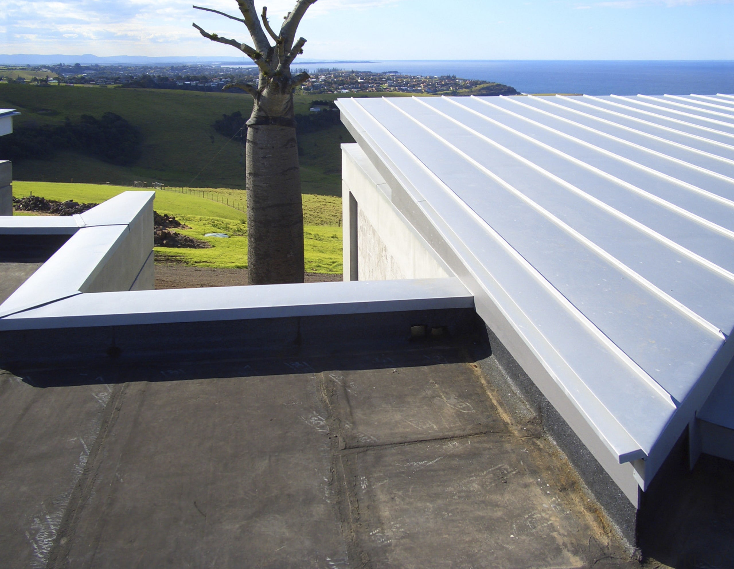 View of the roofing materials supplied by Architectural automotive exterior, daylighting, outdoor structure, roof, white