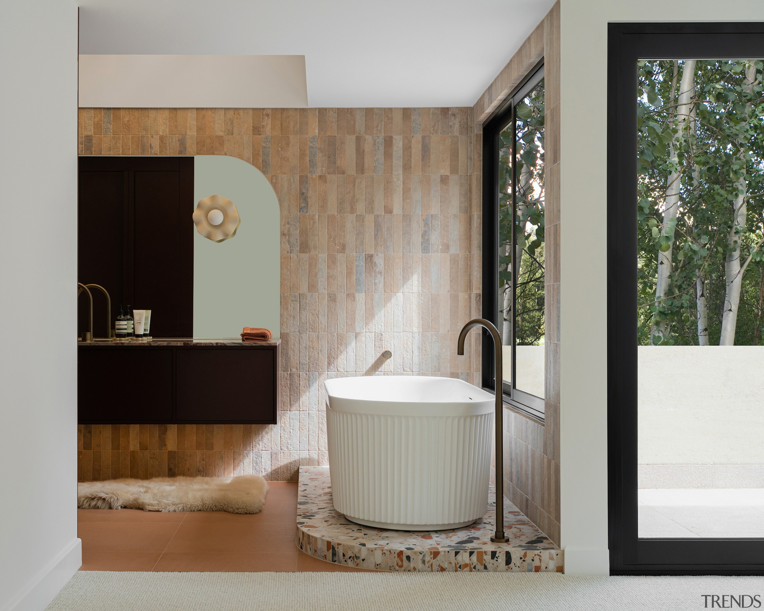 A terrazzo plinth was added with a curved 