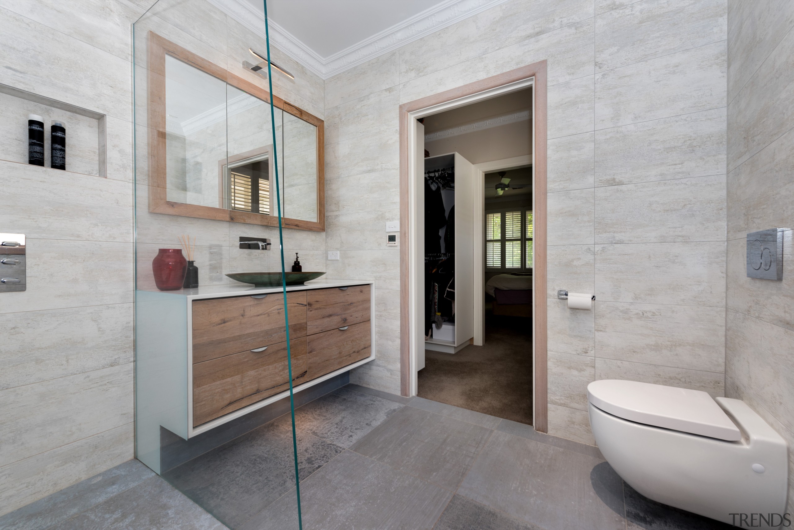 The master ensuites soothing natural palette comprises, porcelain, architecture, bathroom, floor, flooring, interior design, property, real estate, room, tile, wood flooring, gray