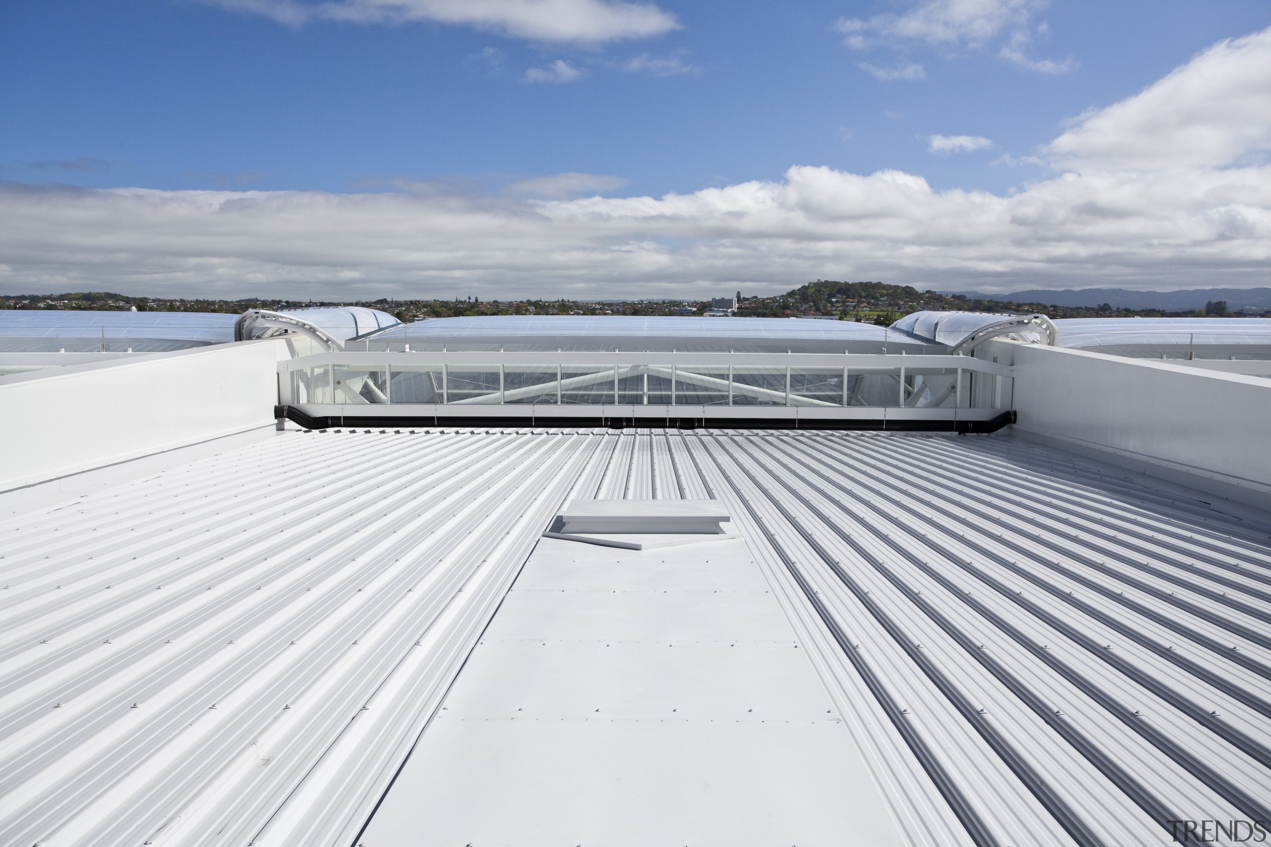 View of the cantilevered roof of the South boat, daylighting, deck, dock, fixed link, roof, sea, sky, water, yacht, white