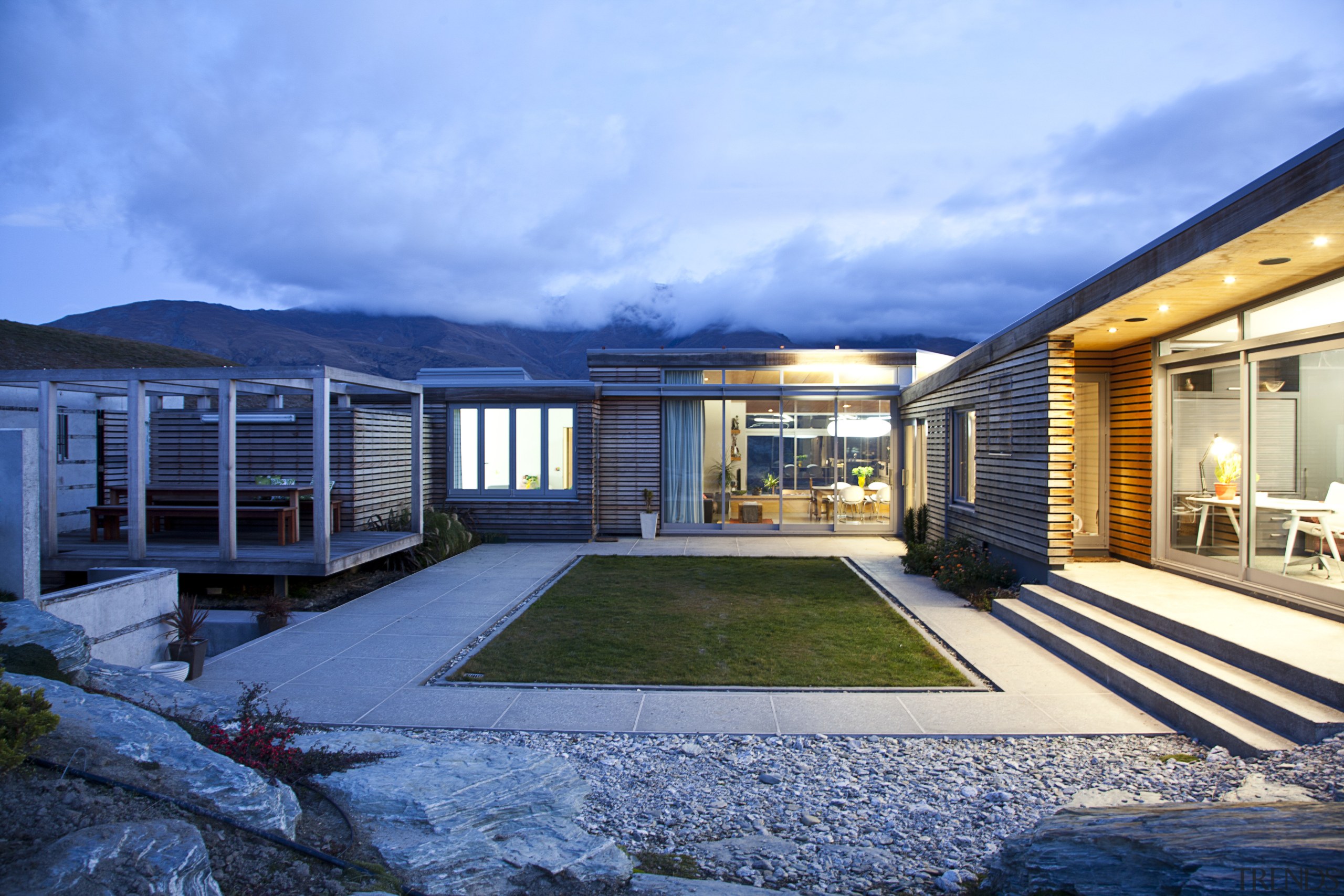 This home was designed by architect Nick Karlovsky. architecture, cottage, estate, facade, home, house, property, real estate, residential area, roof, sky, villa, window, teal, blue