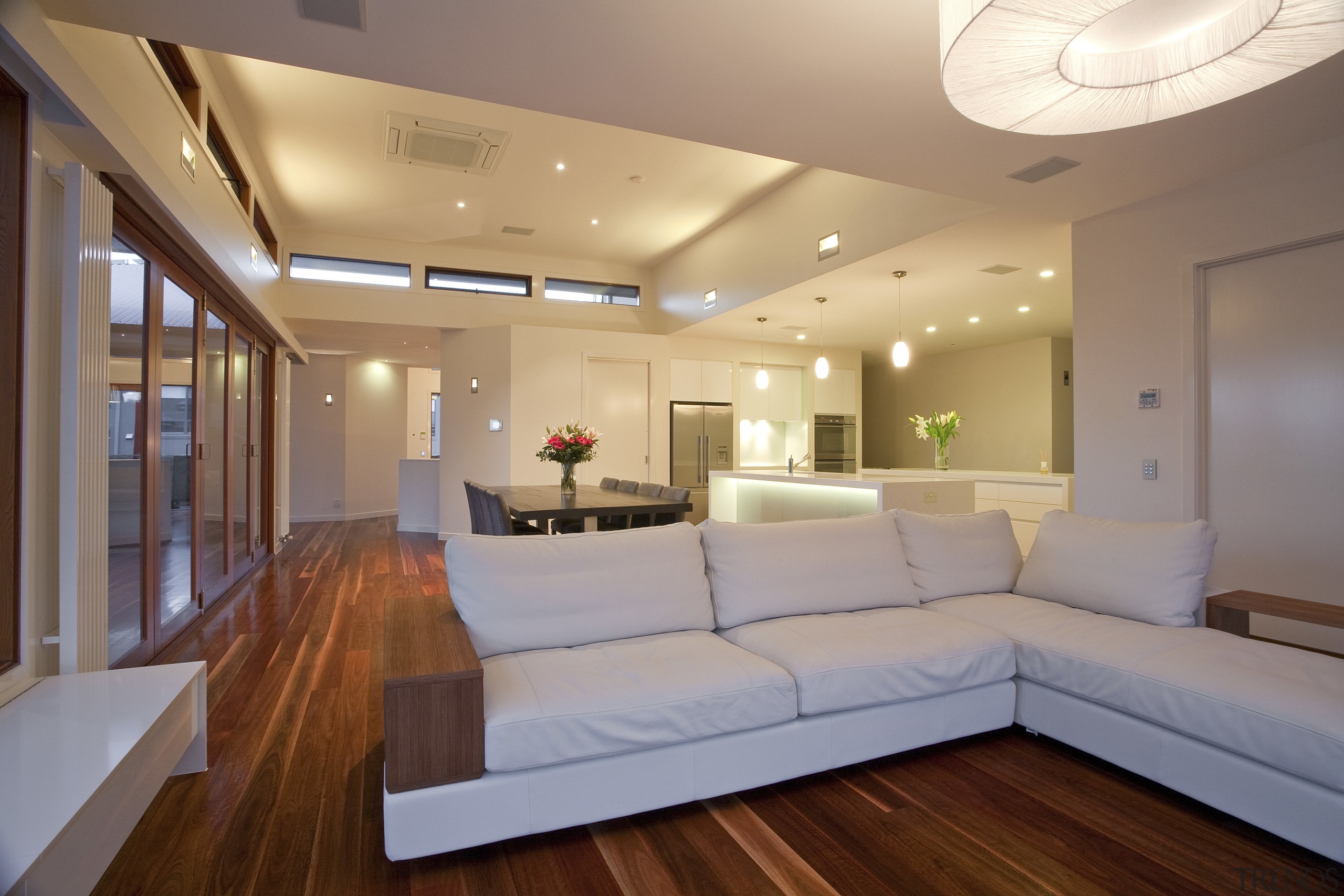 View from living room out to pool. Features ceiling, floor, interior design, living room, real estate, room, gray, orange