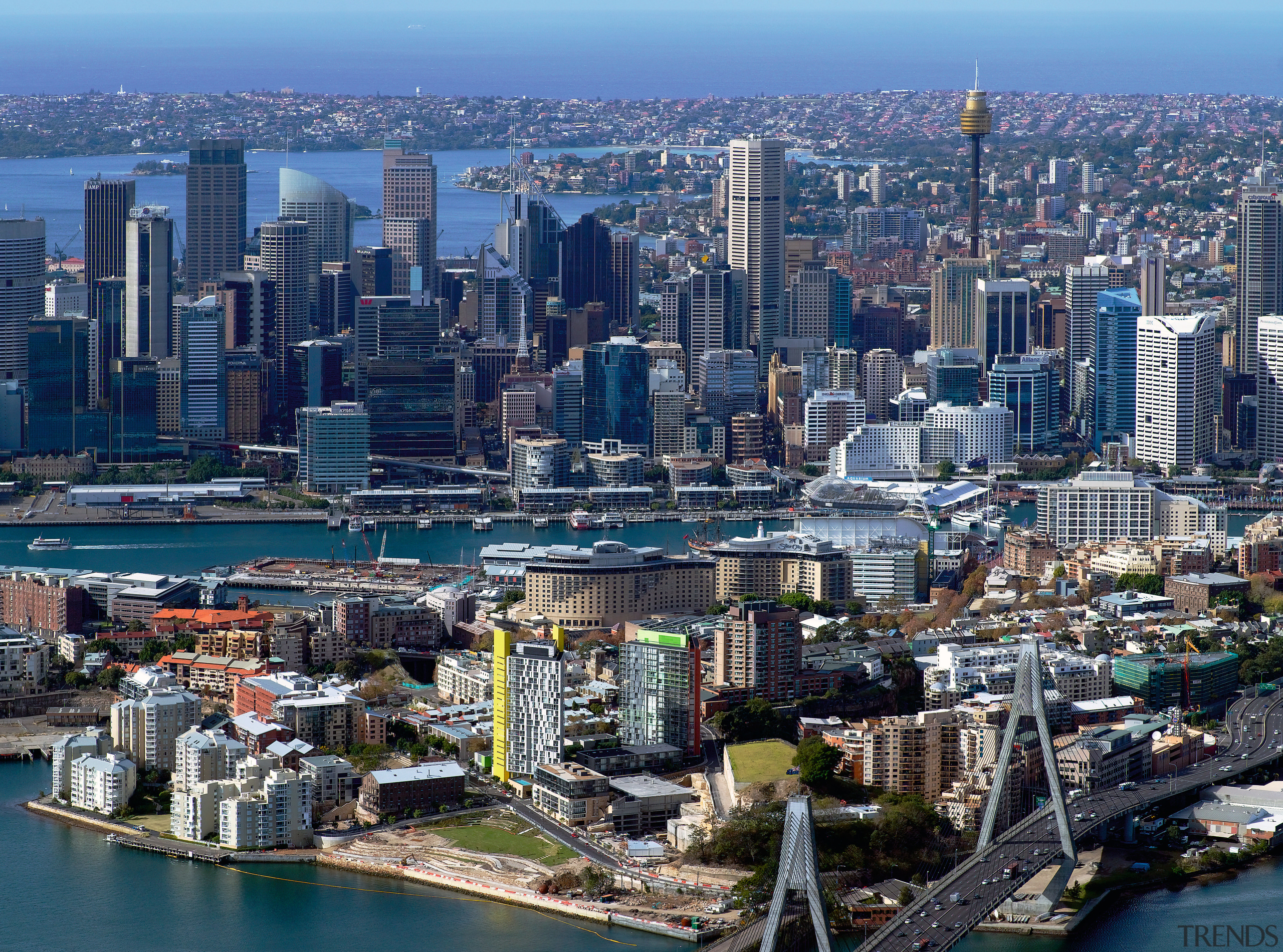 View of Jacksons Landing development in Sydney with aerial photography, bird's eye view, building, city, cityscape, daytime, downtown, metropolis, metropolitan area, sky, skyline, skyscraper, suburb, tower block, urban area, water, blue