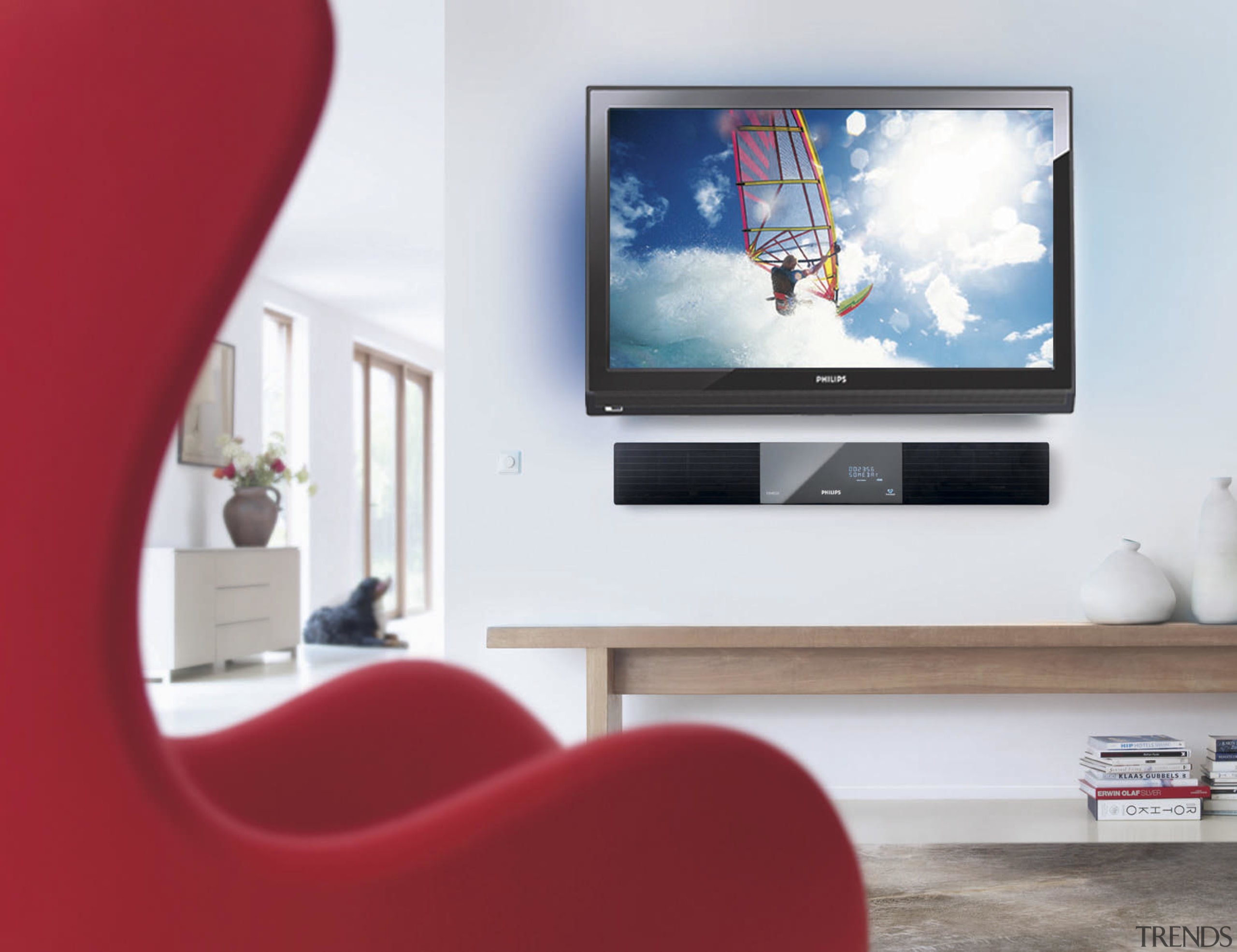 A view a home theatre system from Phillips display device, flat panel display, furniture, interior design, living room, media, multimedia, product design, room, table, television, white, red
