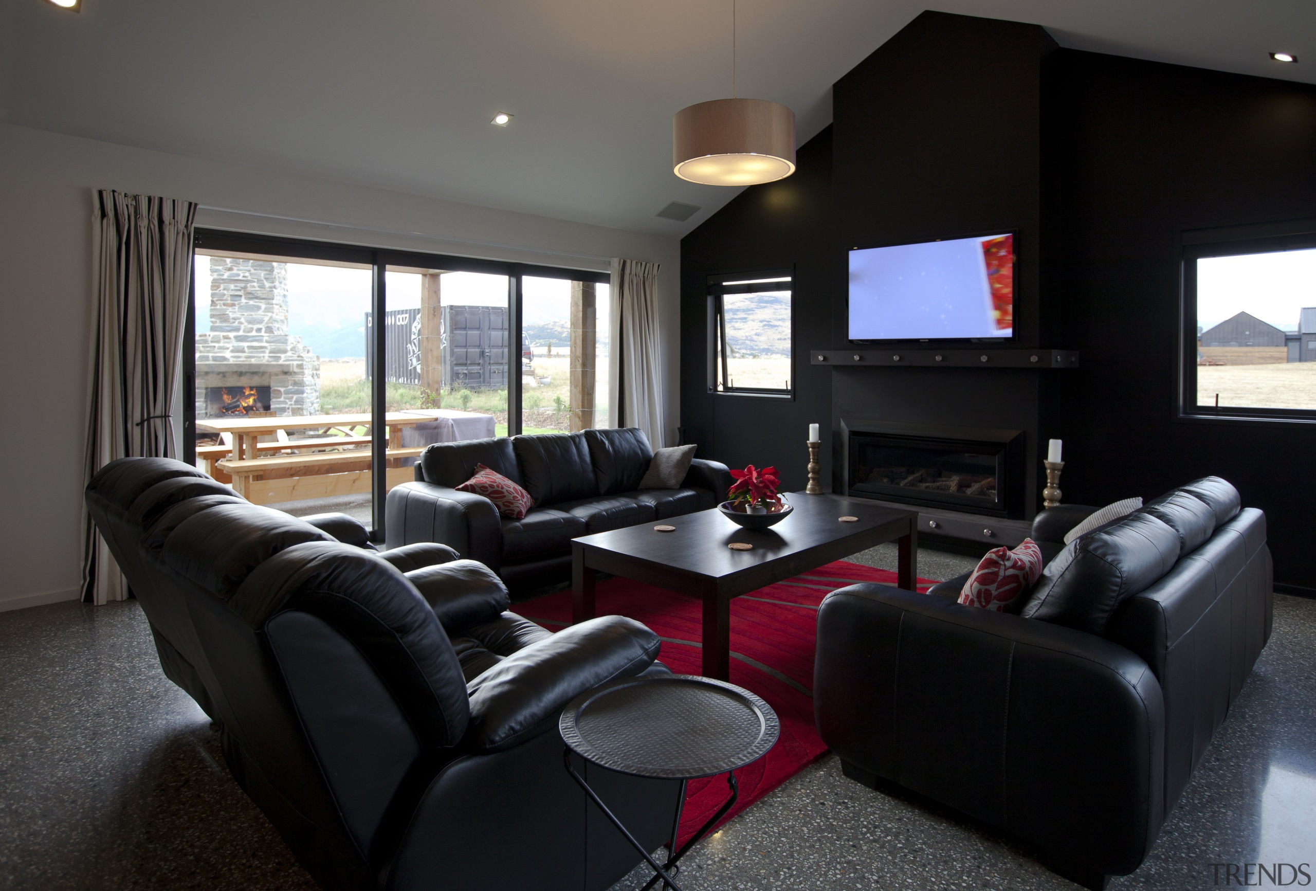 Lounge with dark feature wall, blac... Gallery 11 Trends