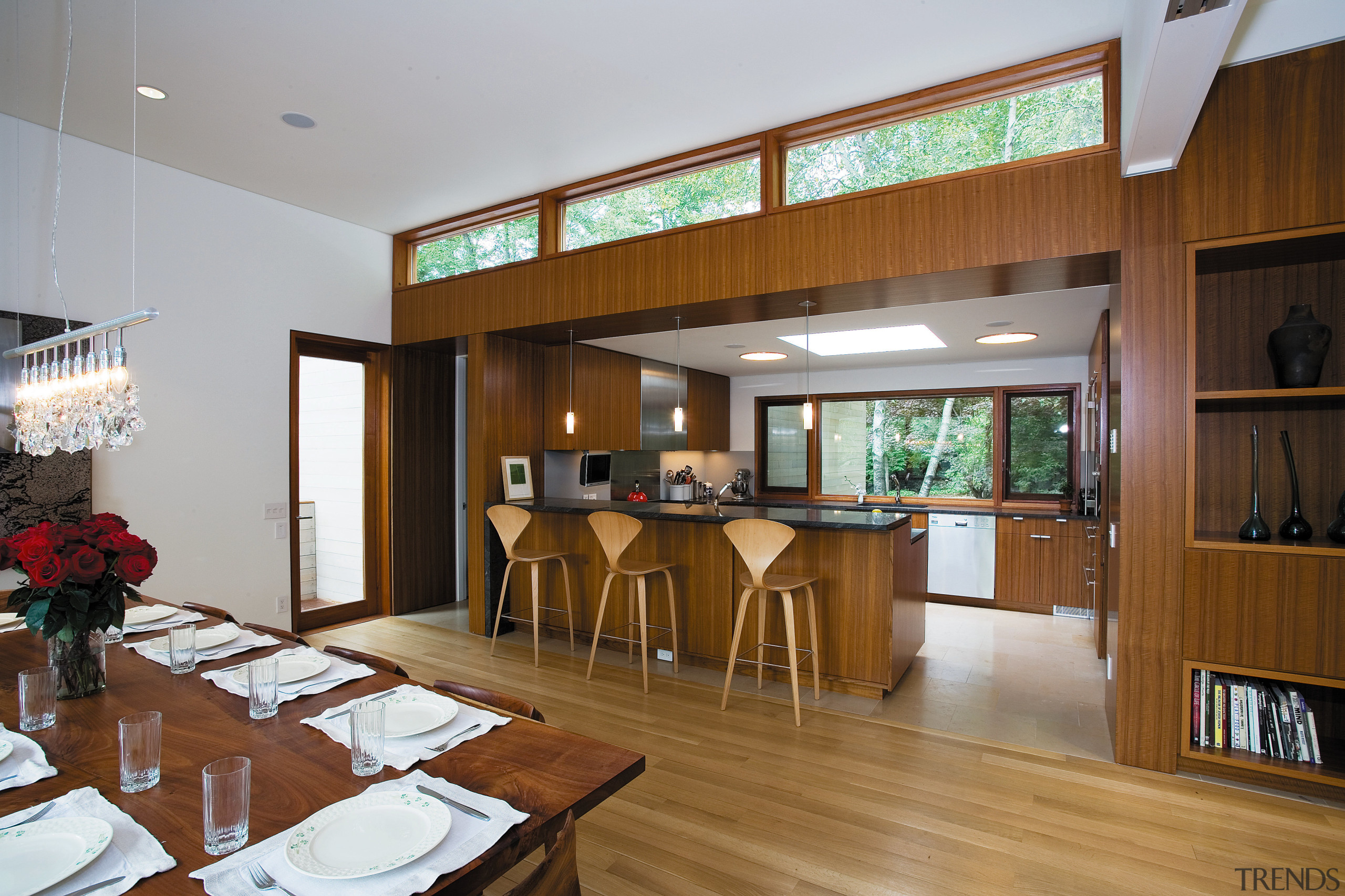 view of the kitchen dining area featuring teak dining room, interior design, real estate, room, brown, gray