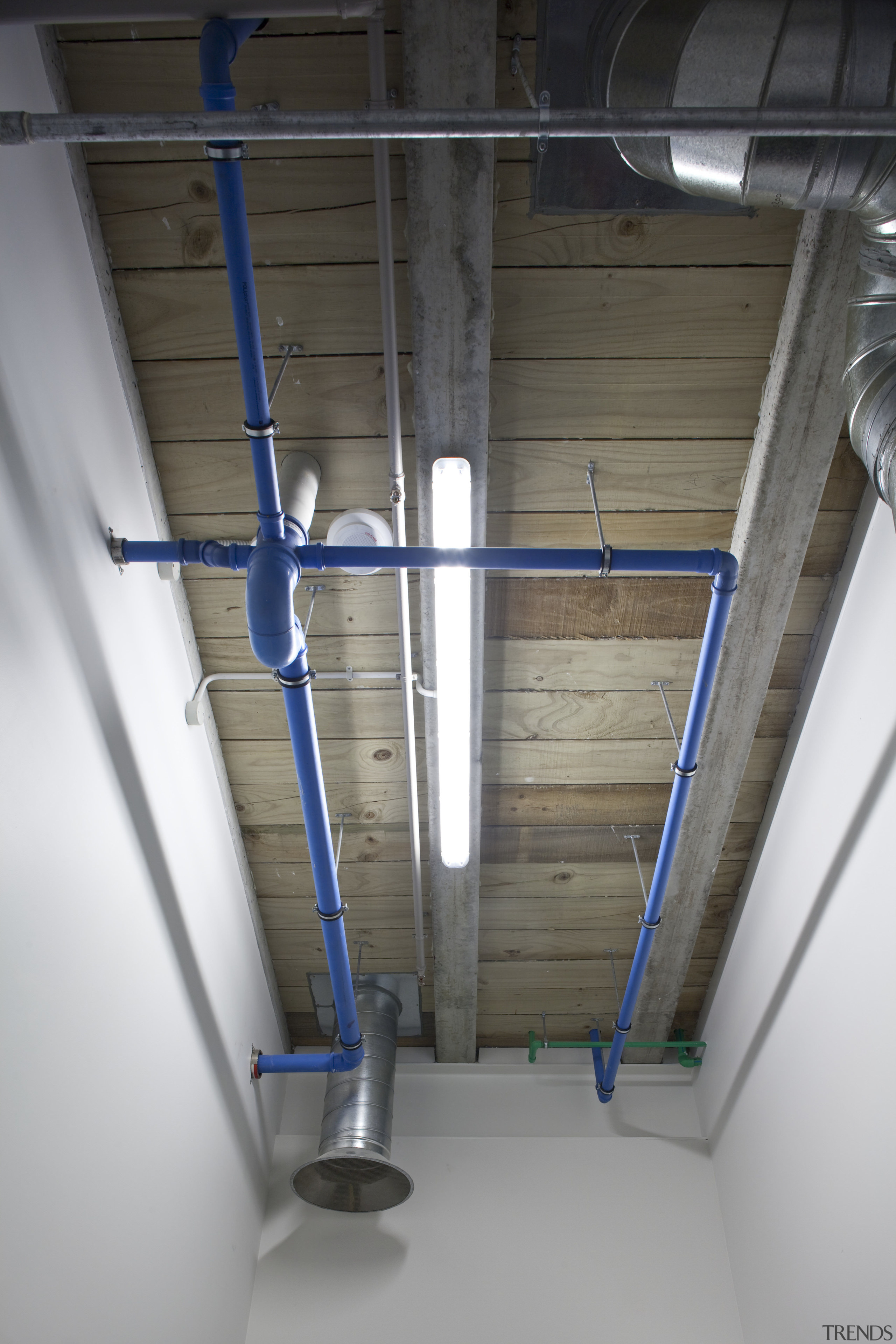 View of roofing and heating systems supplied by ceiling, daylighting, floor, structure, gray, black